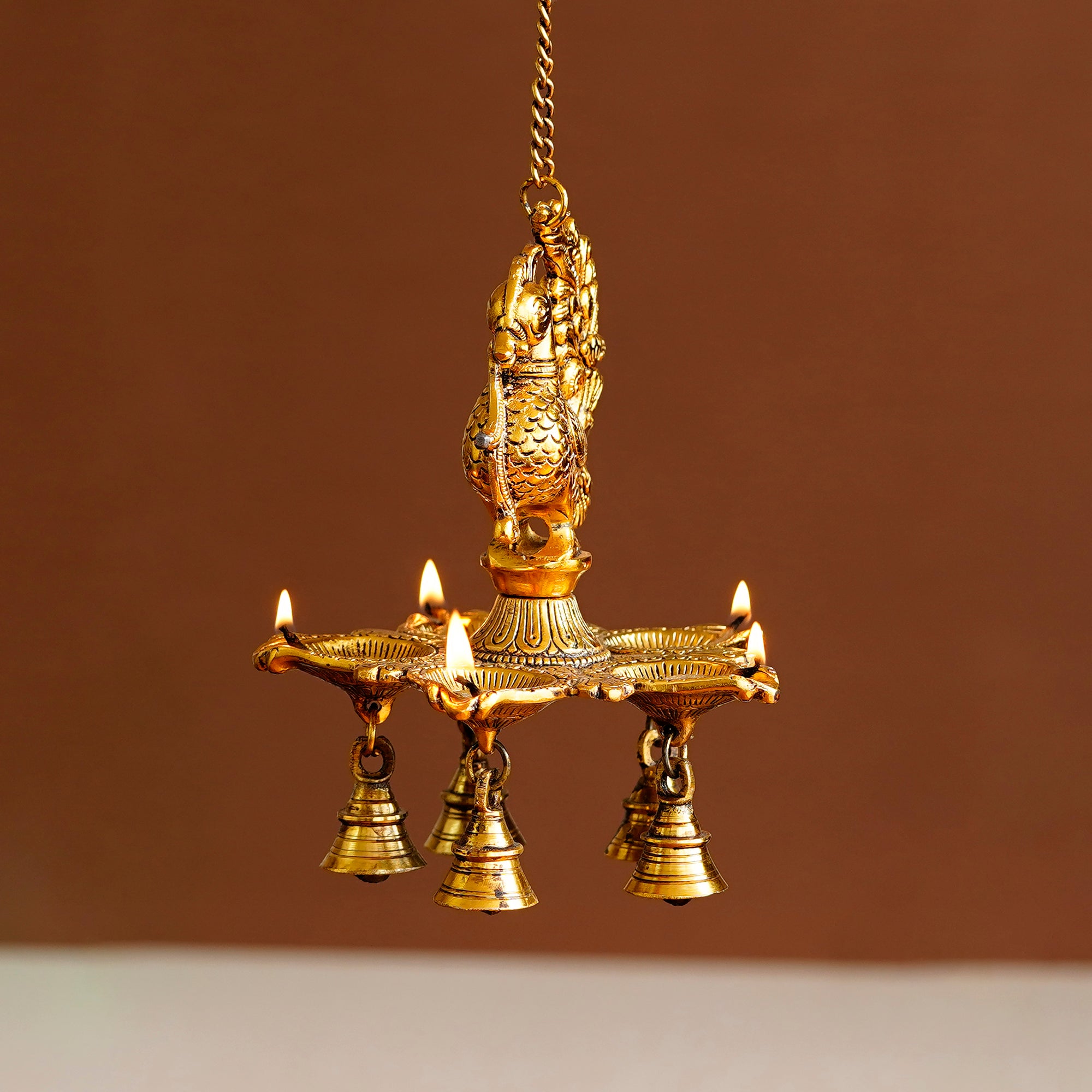 Five Wicks Decorative Peacock Diya With Bell Metal Wall Hanging With Chain