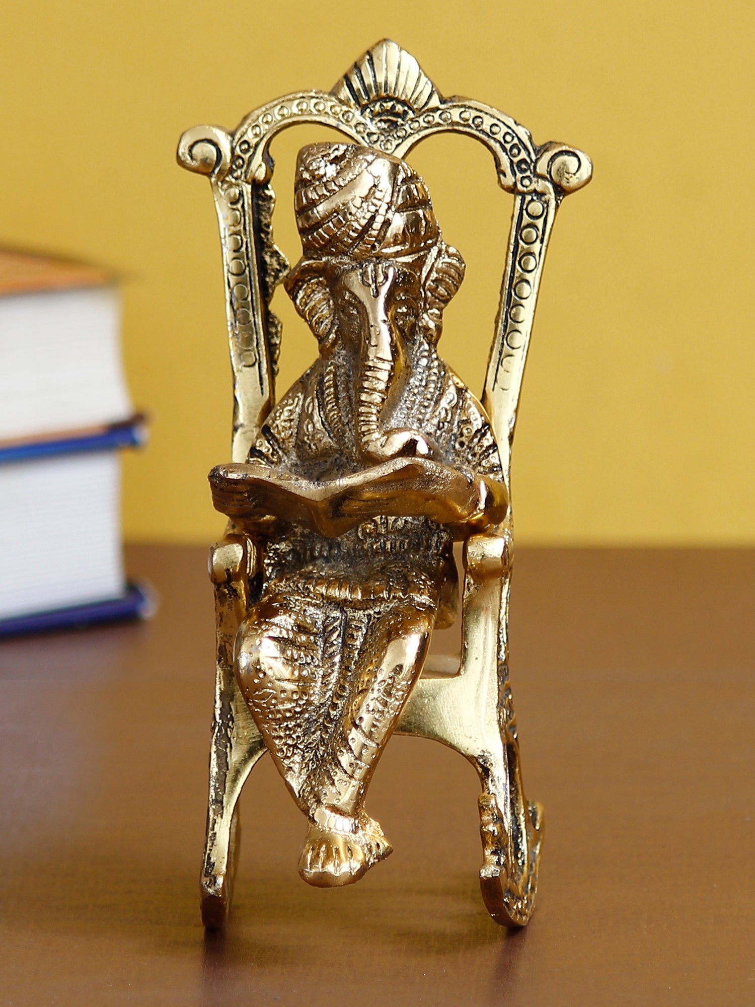 Golden Metal Lord Ganesha Idol Reading Book on Rocking Chair 1