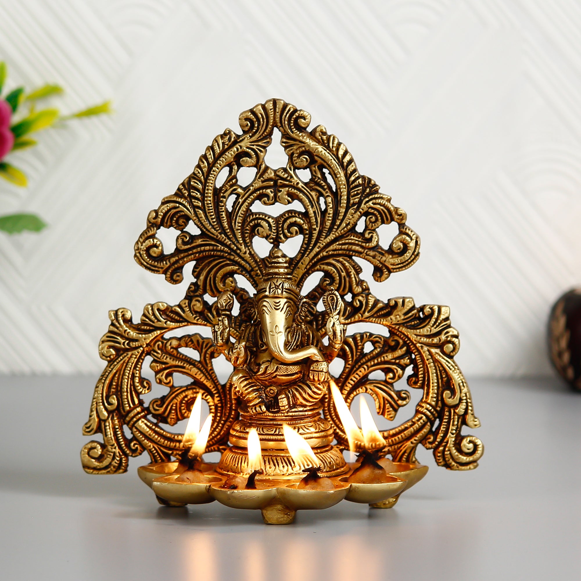 Golden Brass Handcrafted Lord Ganesha Idol with Diya for 6 Wicks