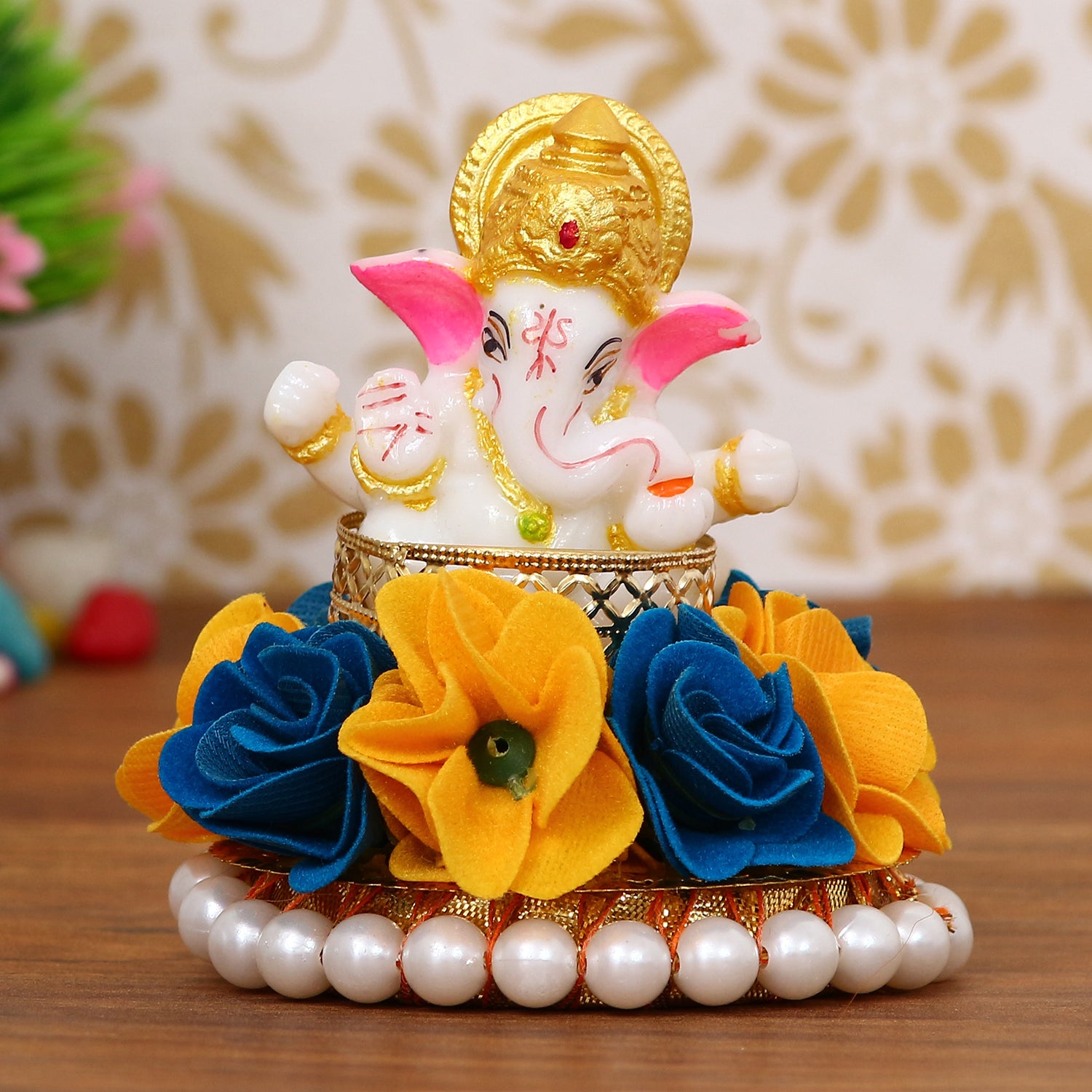 Lord Ganesha Idol on Decorative Handcrafted Plate with Yellow and Blue Flowers