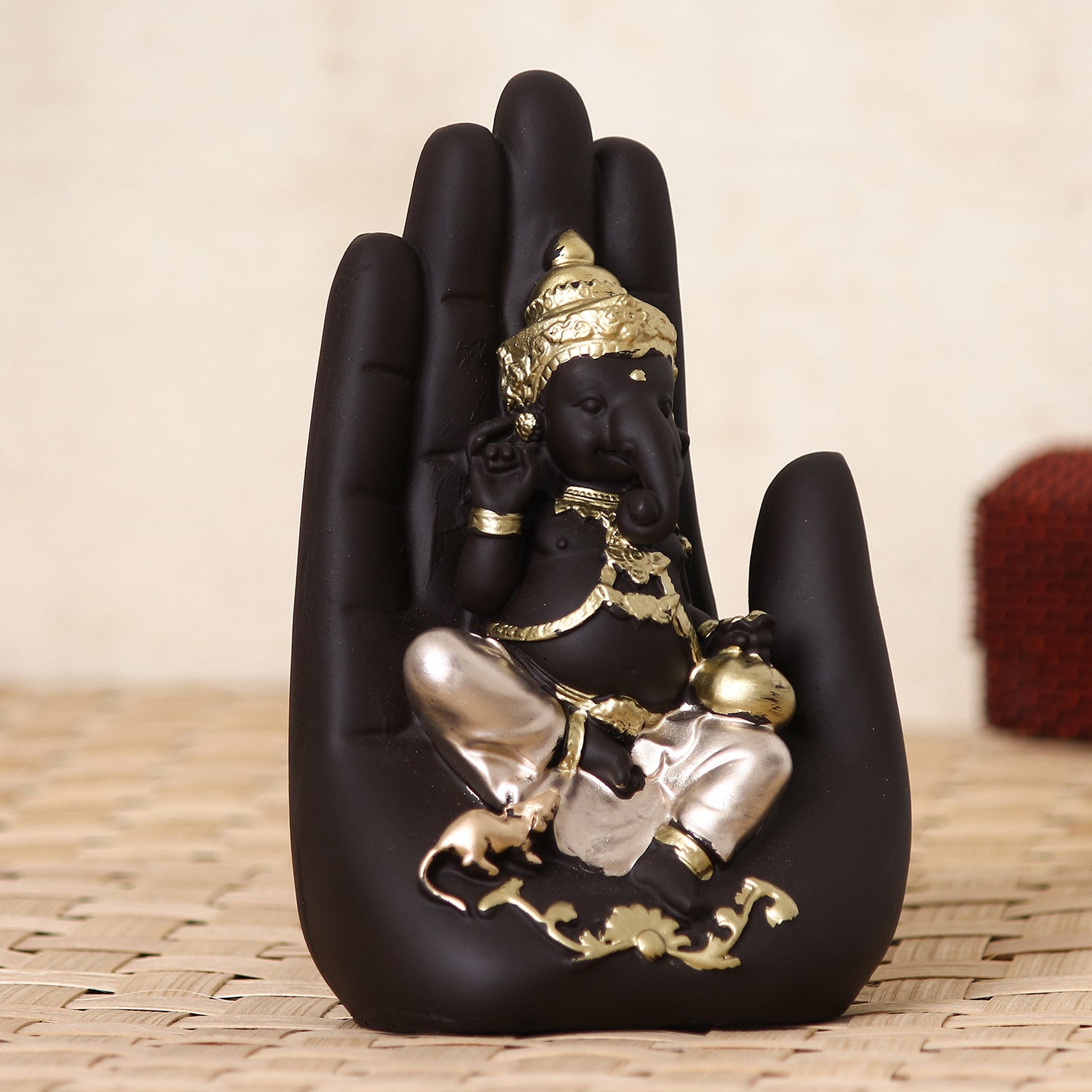 Black and Golden Handcrafted Polyresin Palm Ganesha Idol 1