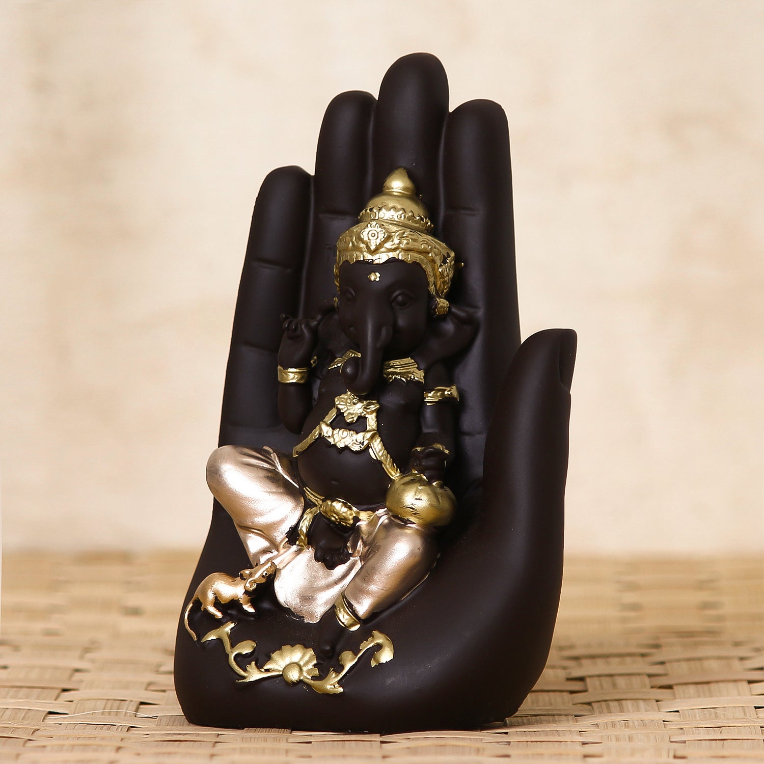 Black and Golden Handcrafted Polyresin Palm Ganesha Idol