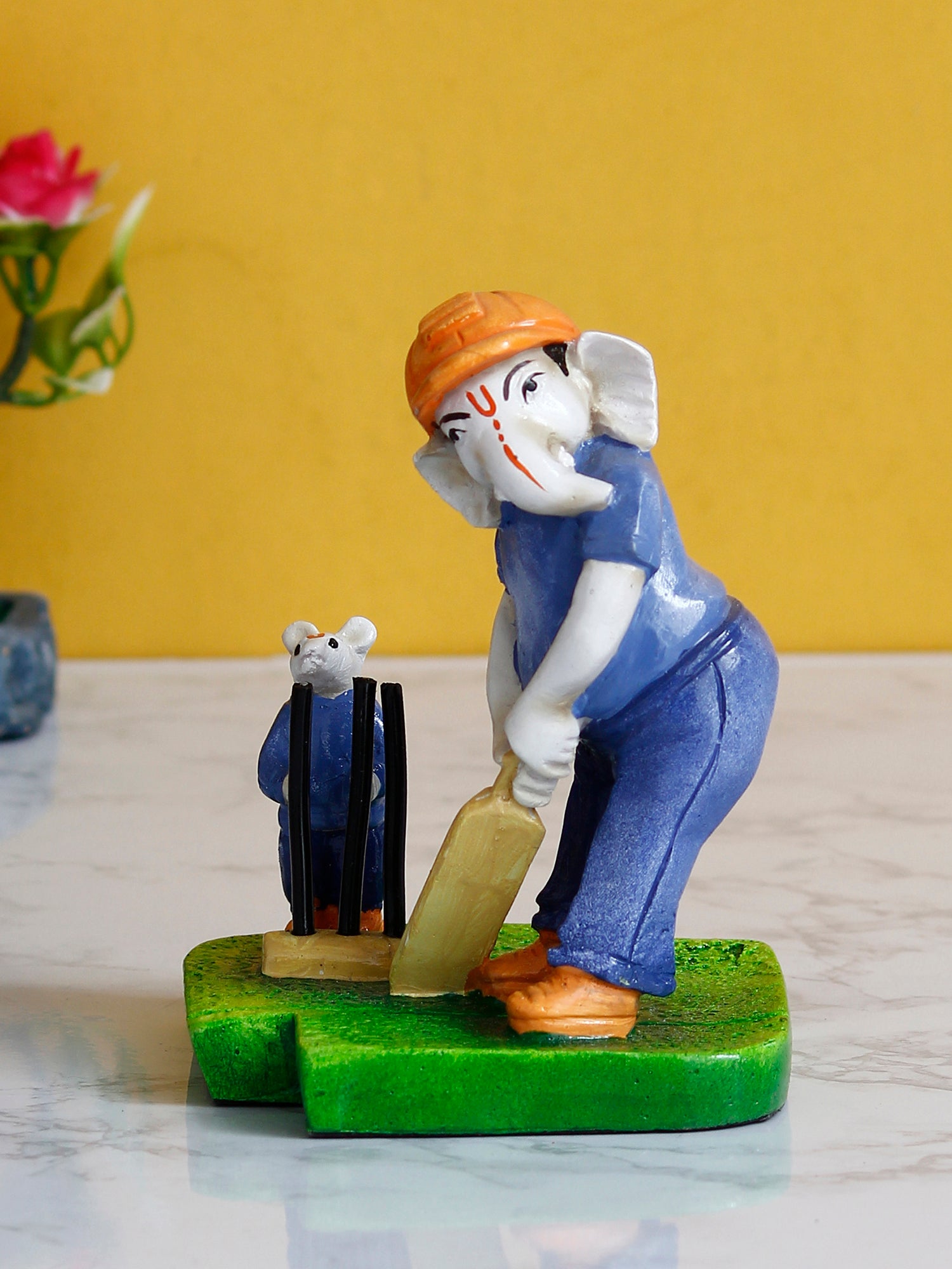 Multicolour Handcrafted Polyresin Lord Ganesha Playing Cricket with Mushak Idol