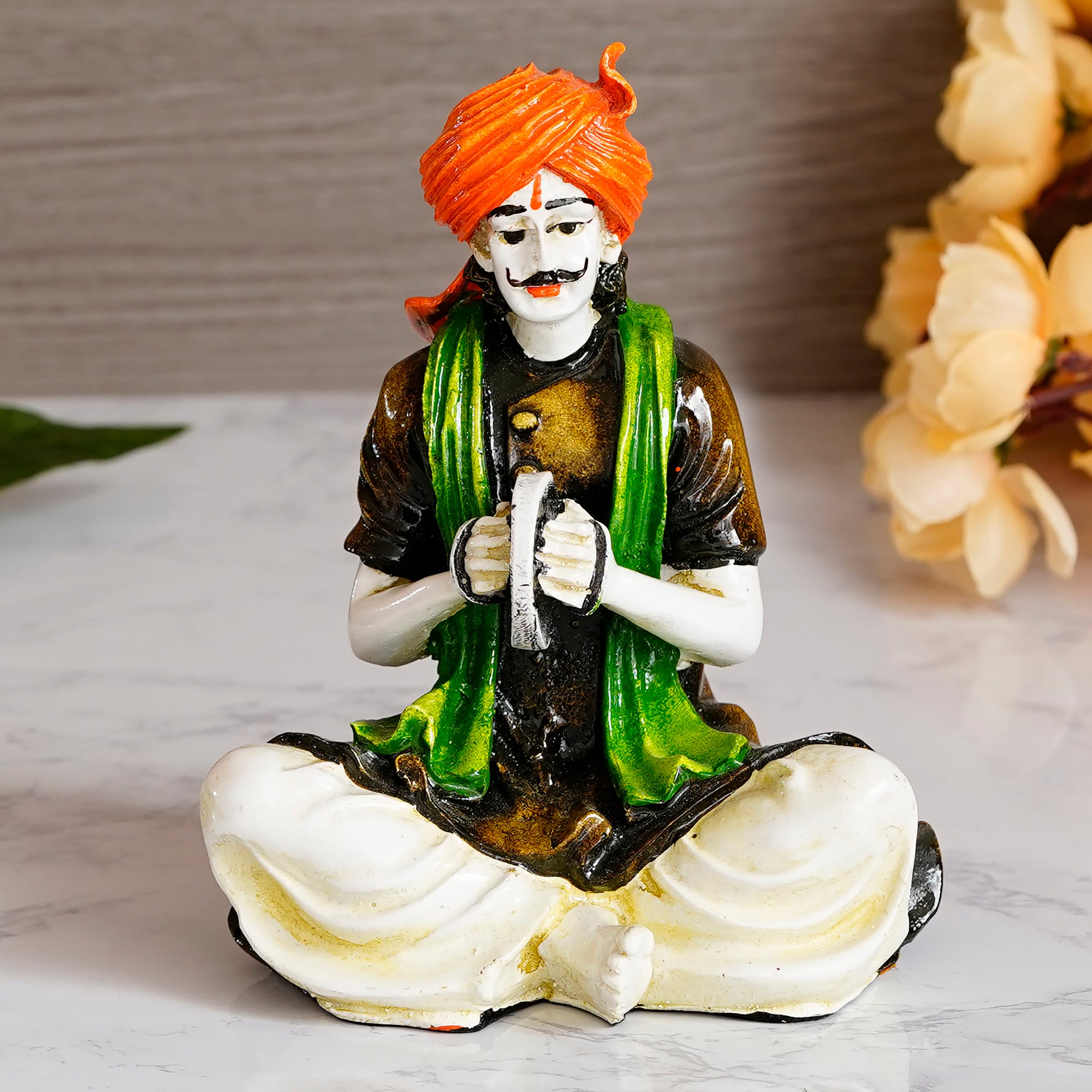 Colorful Rajasthani Man Playing Musical Instrument Handcrafted Decorative Polyresin Showpiece