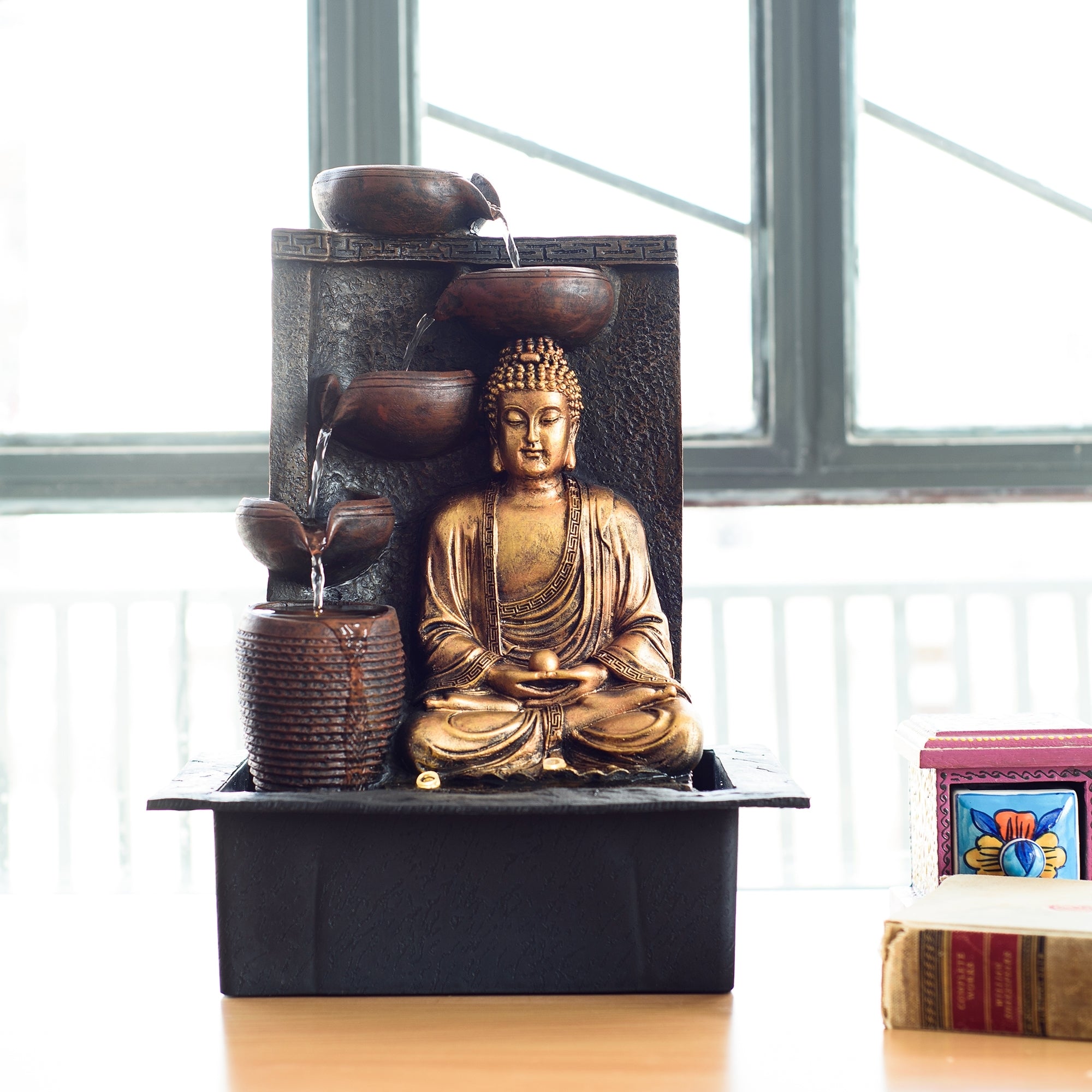 Polystone Brown and Golden Meditating Lord Buddha Water Fountain with LED Light Effects and Water Pump for Home/Office Decor