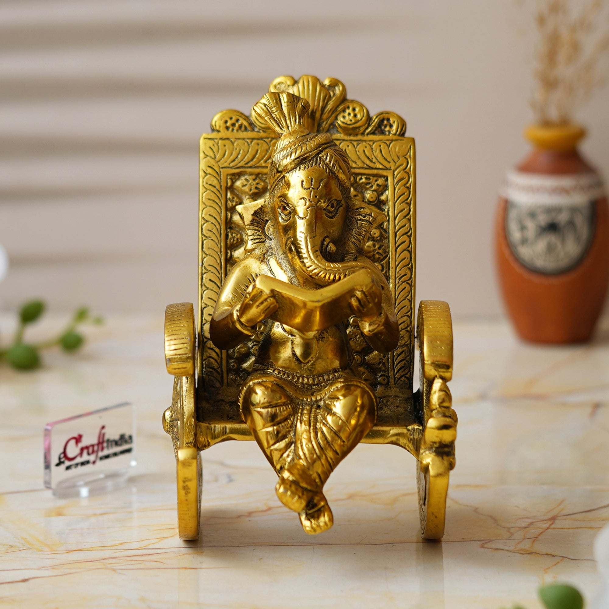 Golden Metal Handcrafted Lord Ganesha Idol Reading Book on Rocking Chair 5