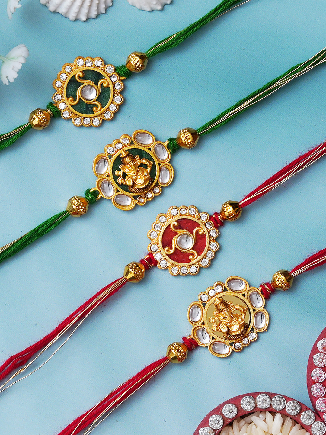 Set of 4 Multicolor Floral & Lord Ganesha Religious Designer Rakhis for Brother, Bhabhi, Kids with Roli Chawal Pack