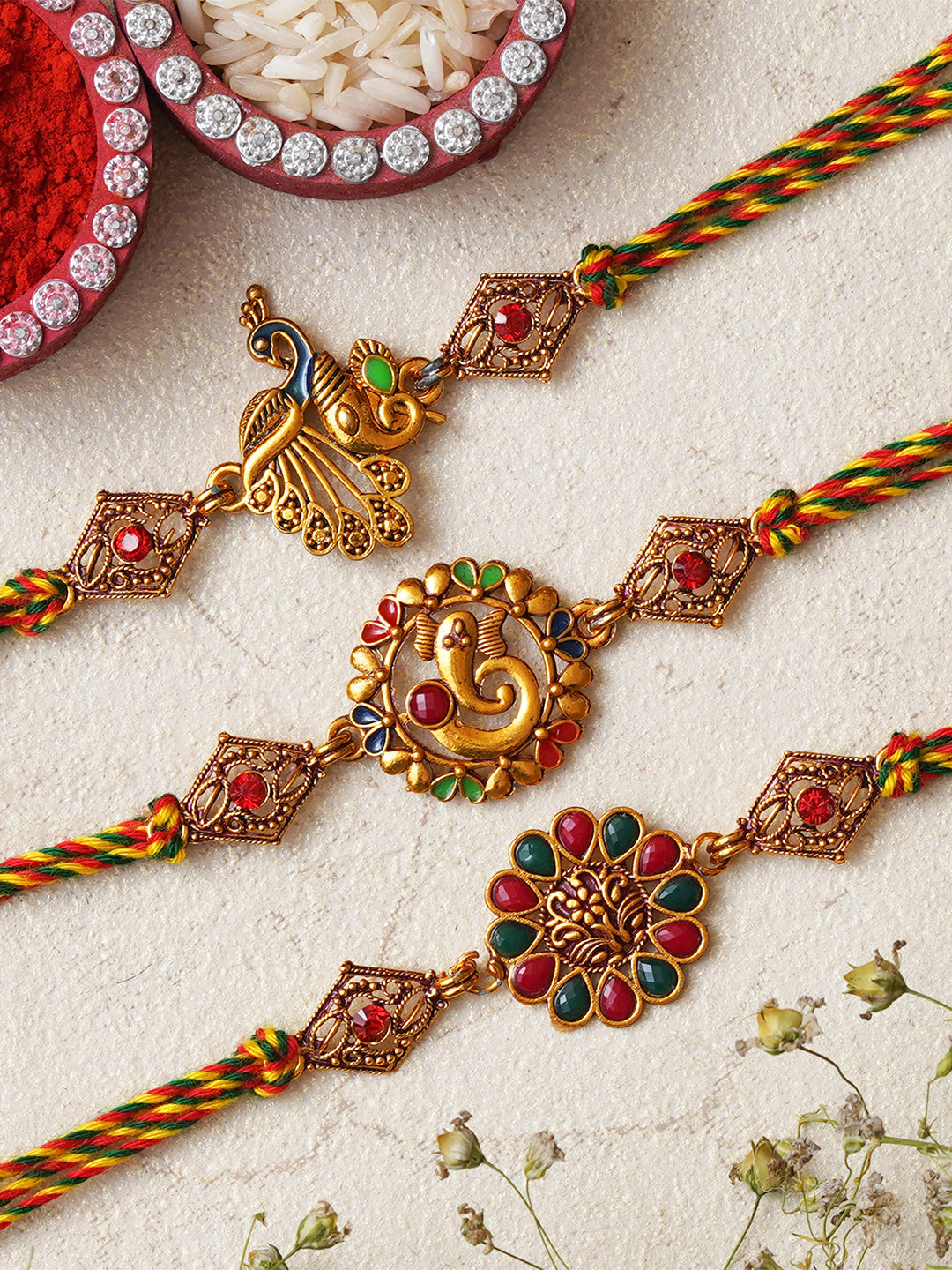 Set of 3 Lord Ganesha, Peacock, and Floral Designer Rakhis for Brother, Bhabhi, Kids with Roli Chawal Pack