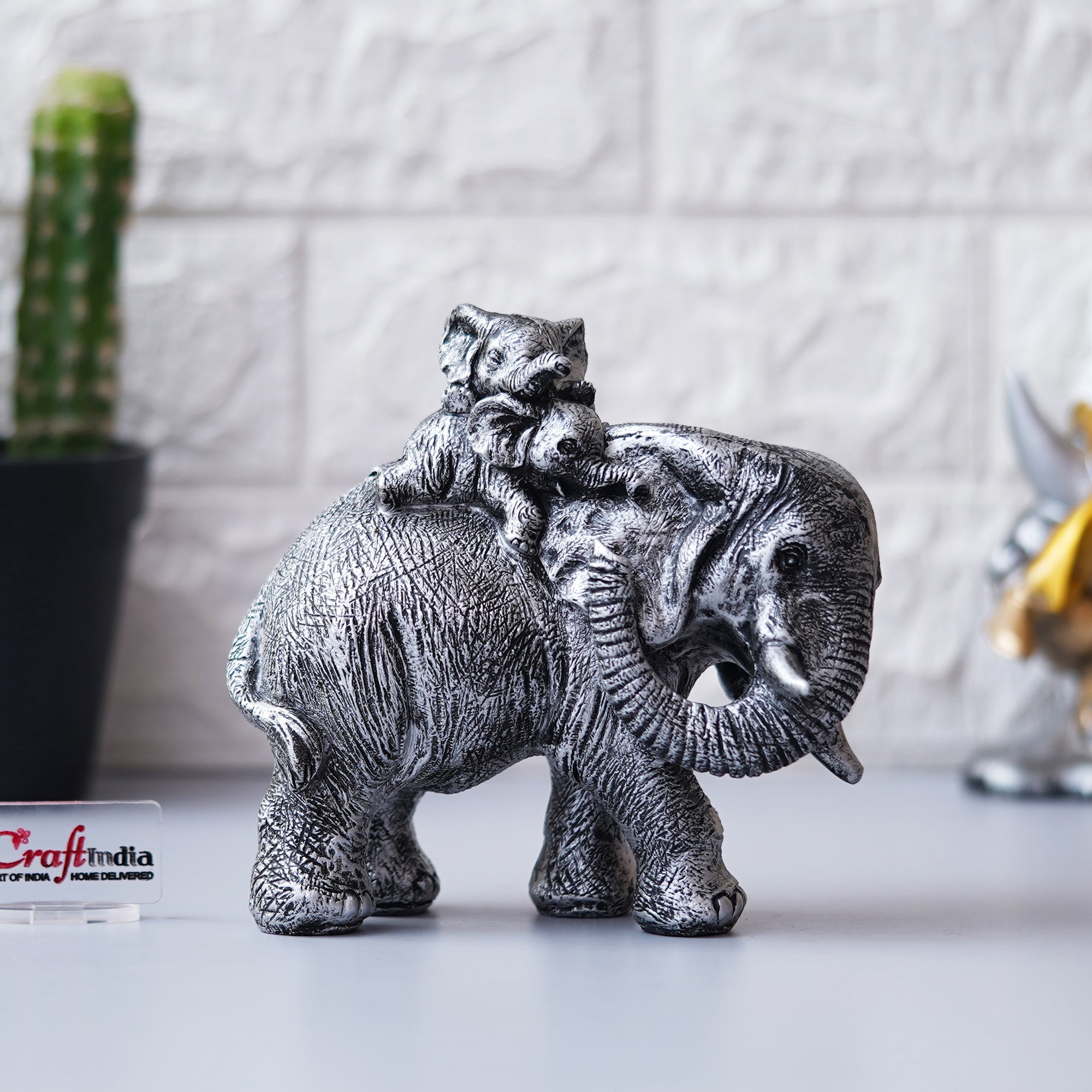 Polyresin Elephant Statue with Baby Elephant on his Back Decorative Showpiece