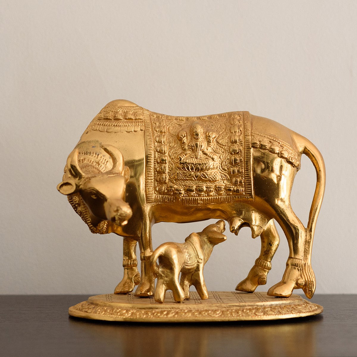 Golden Metal Kamdhenu Cow and Calf statue