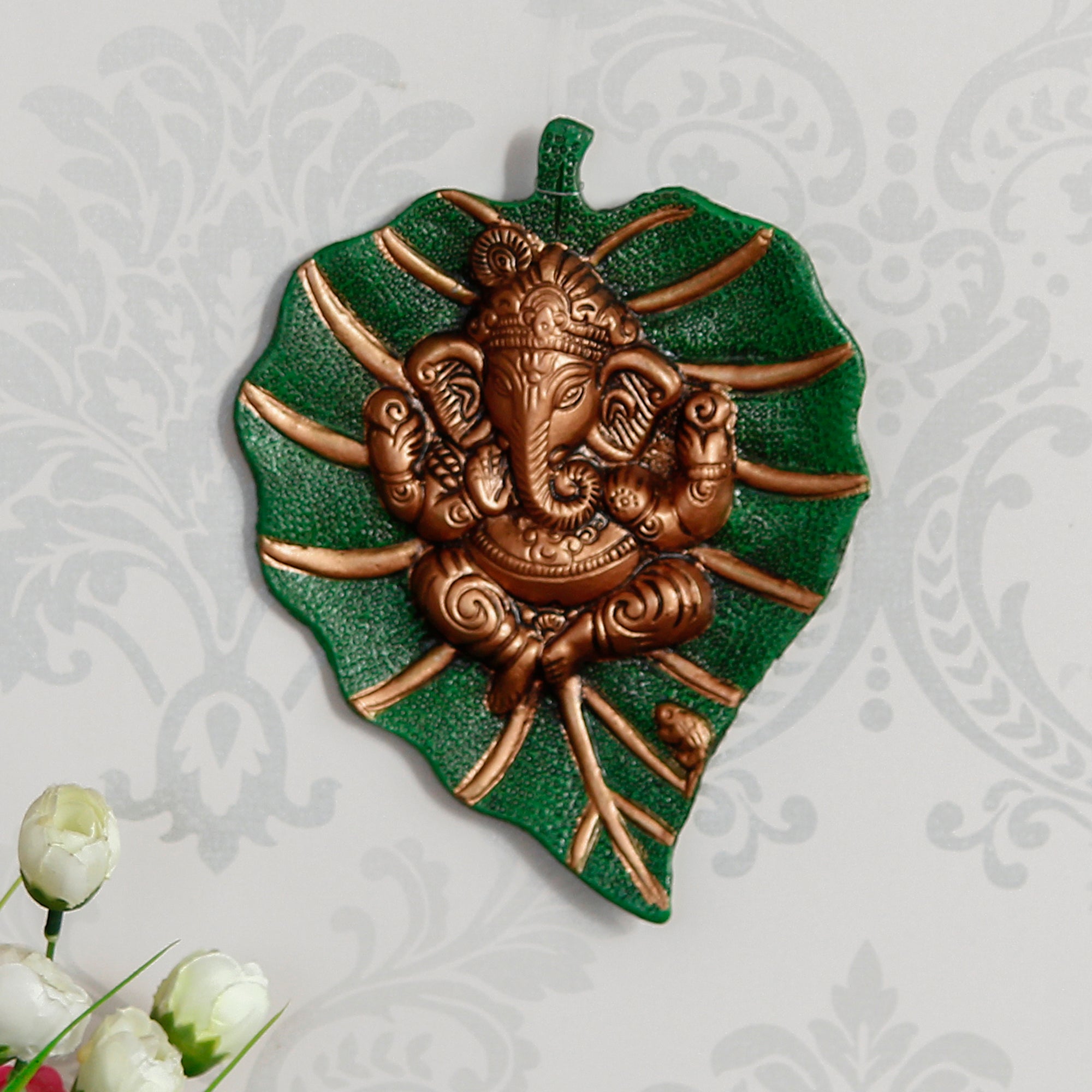 Brown Beautiful Lord Ganesha On Green Leaf Metal Wall Hanging