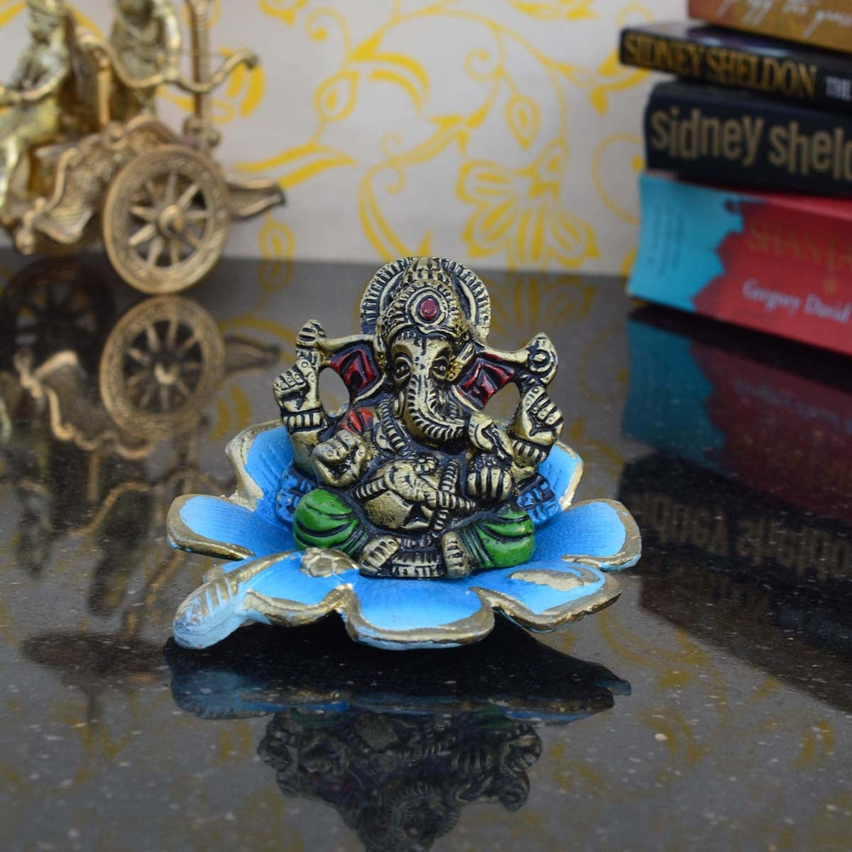Metal Lord Ganesha Statue On Sky Blue Leaf 1
