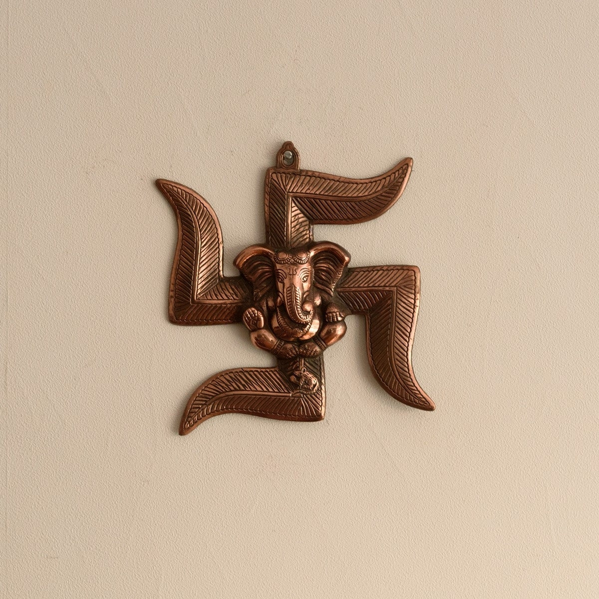 Brown Lord Ganesha on Swastik Metal Wall Hanging