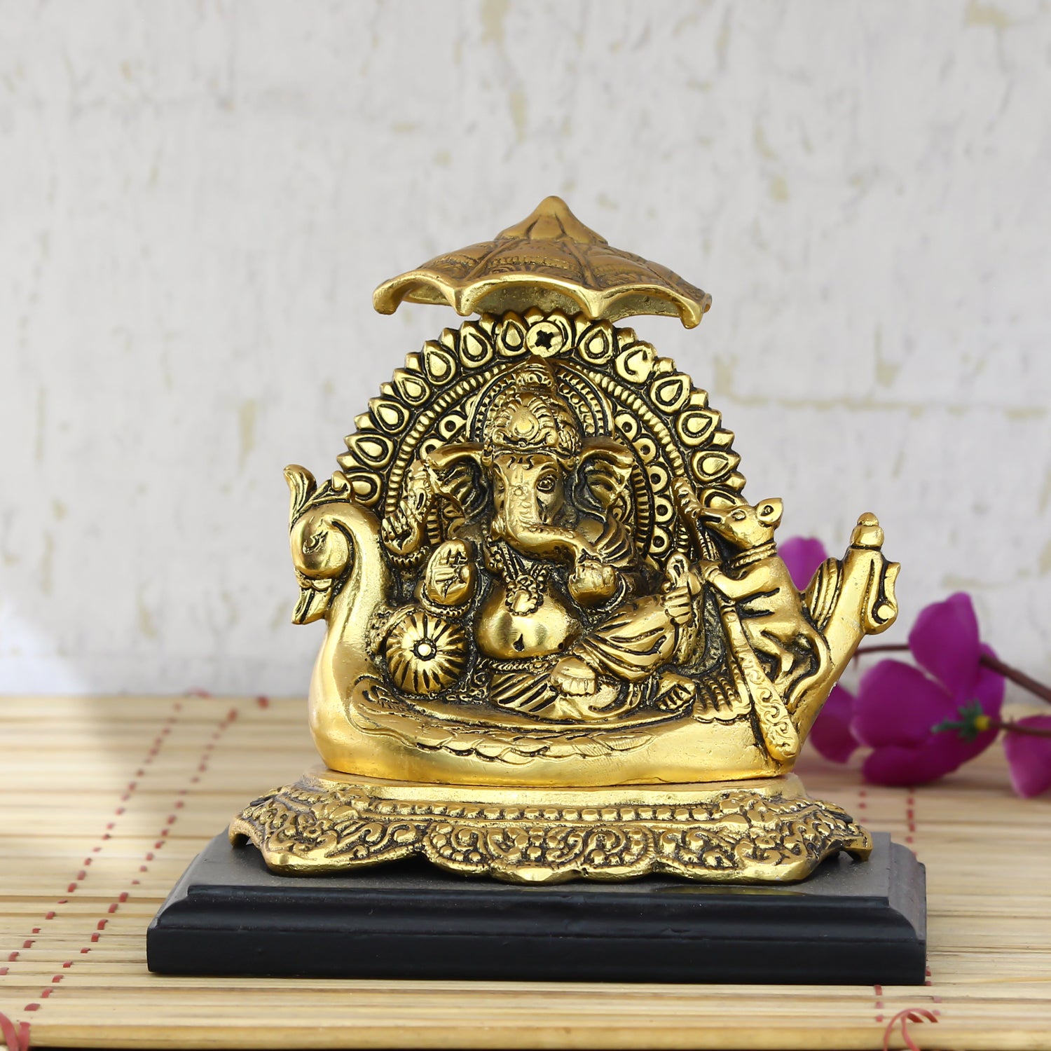 Golden Lord Ganesha sitting on Swan Throne
