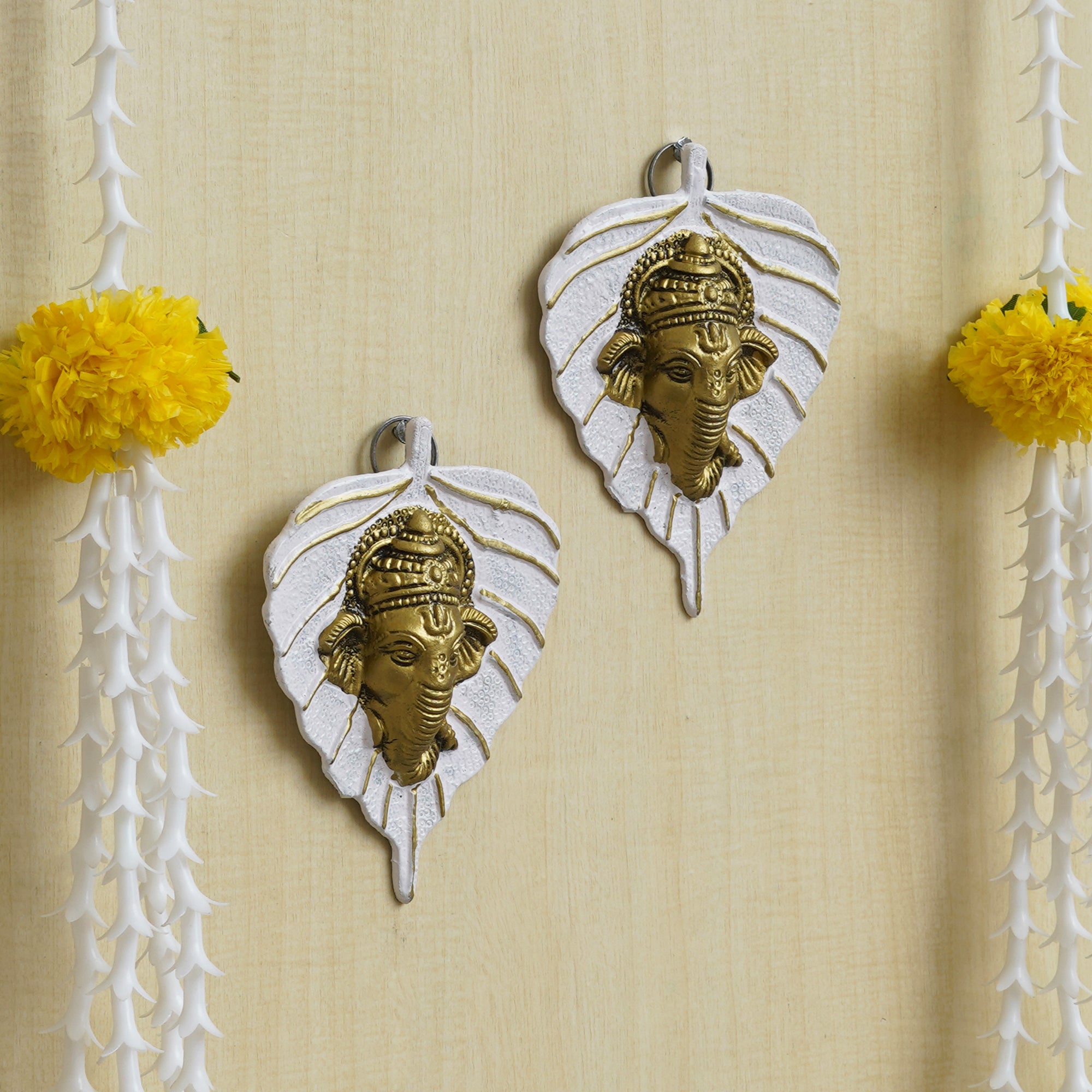eCraftIndia Set of 2 Golden and White Peepal Leaf Ganesha Wall Hangings