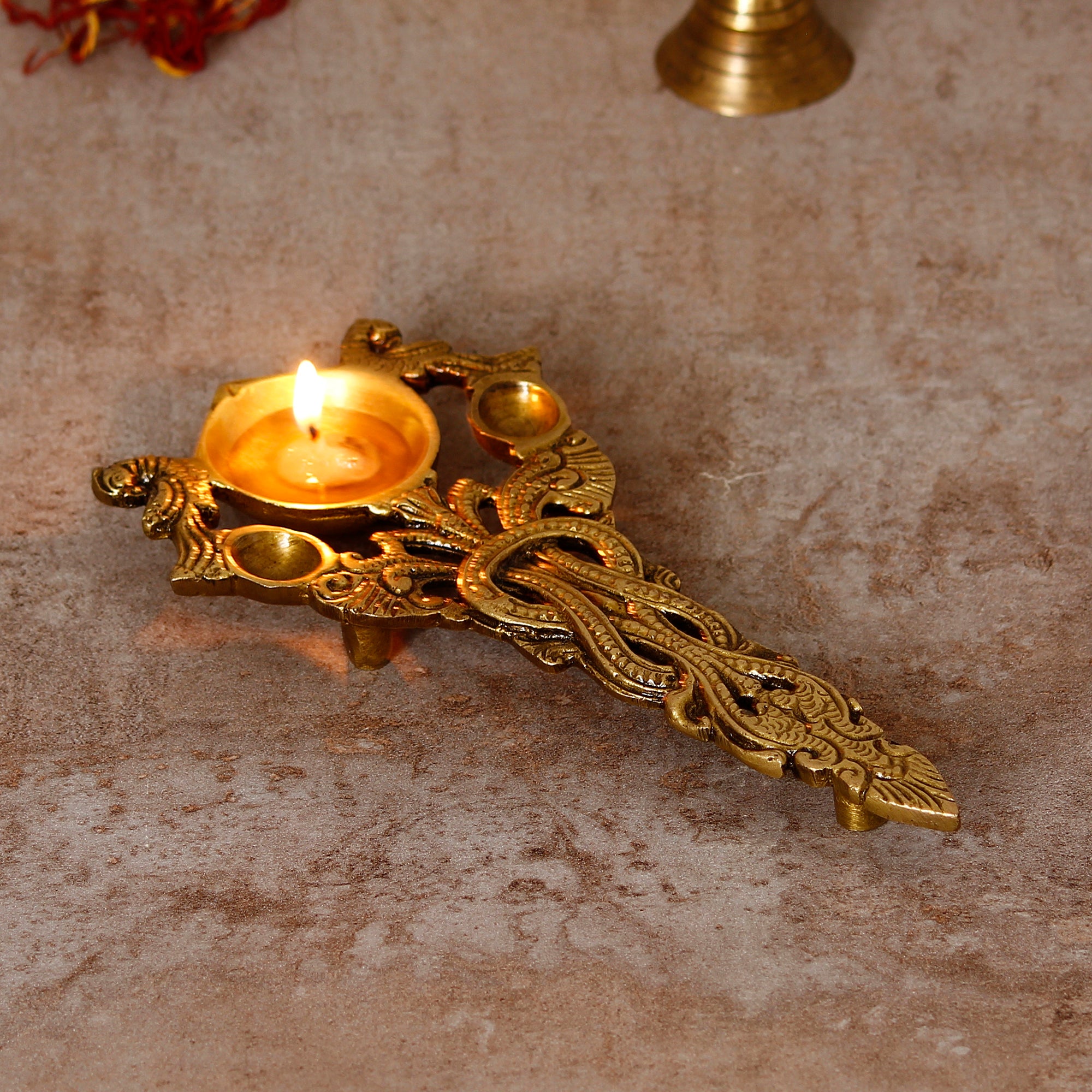Golden Ethnic Carved Brass Diya With Handle For Pooja Room And Temples