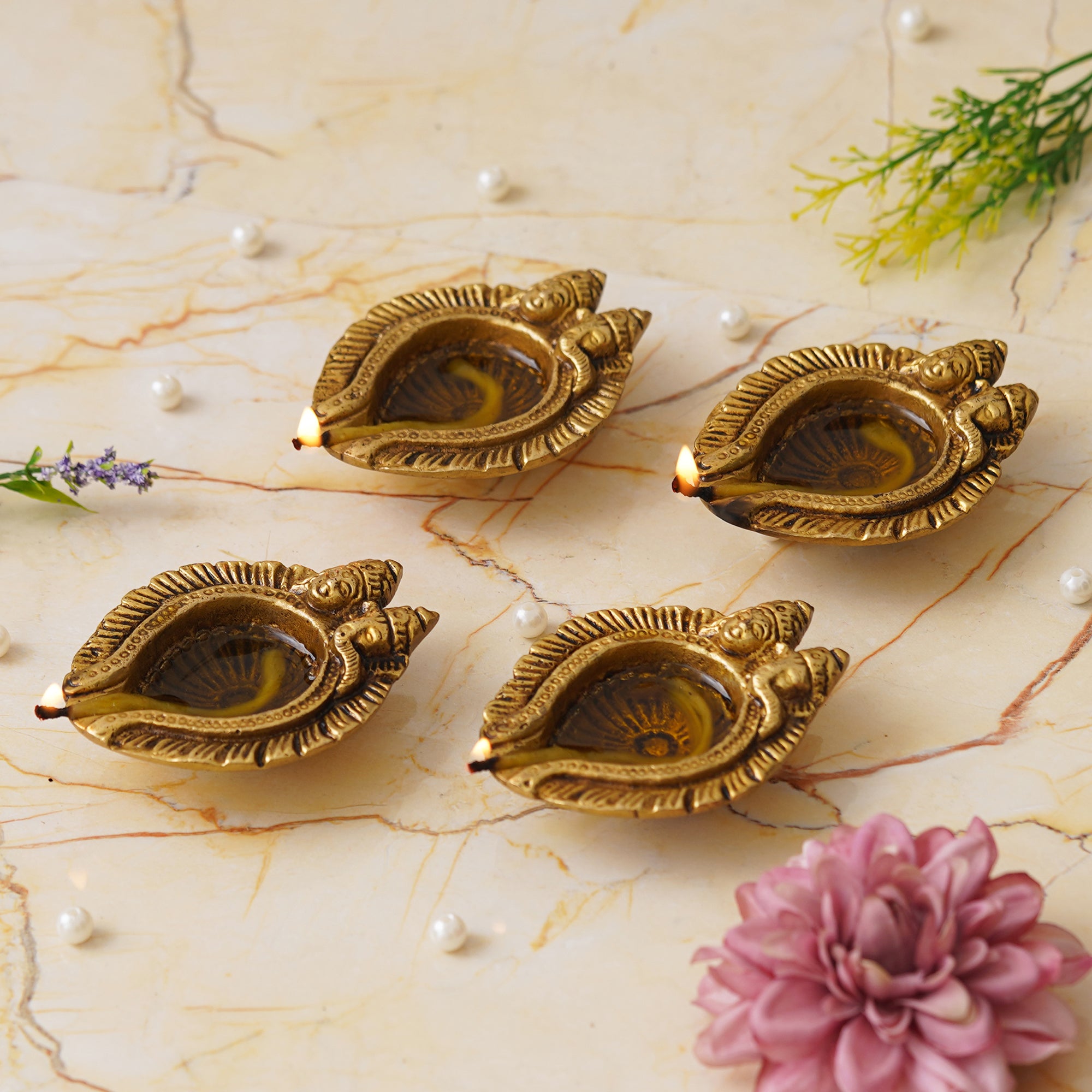 eCraftIndia Set of 4 Golden Handcrafted Goddess Lakshmi and Lord Ganesha Design Auspicious Brass Diyas 1