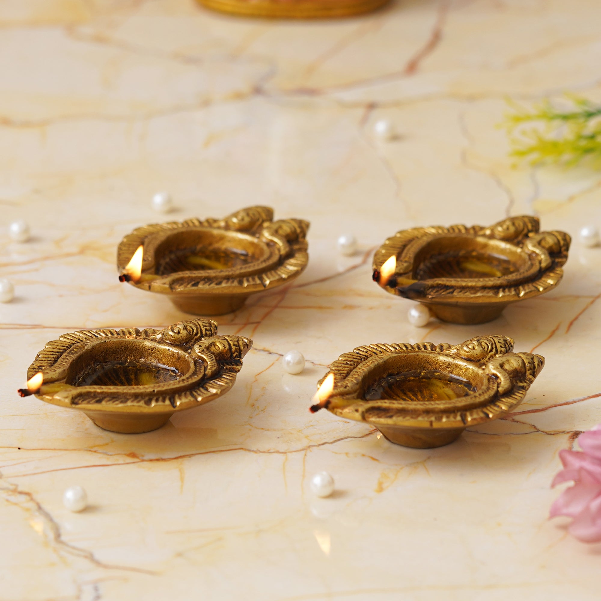 eCraftIndia Set of 4 Golden Handcrafted Goddess Lakshmi and Lord Ganesha Design Auspicious Brass Diyas 4