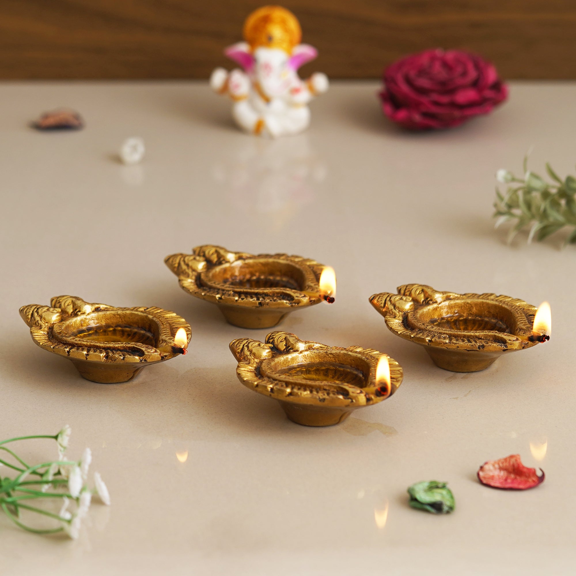 eCraftIndia Set of 4 Golden Handcrafted Goddess Lakshmi and Lord Ganesha Design Auspicious Brass Diyas 5