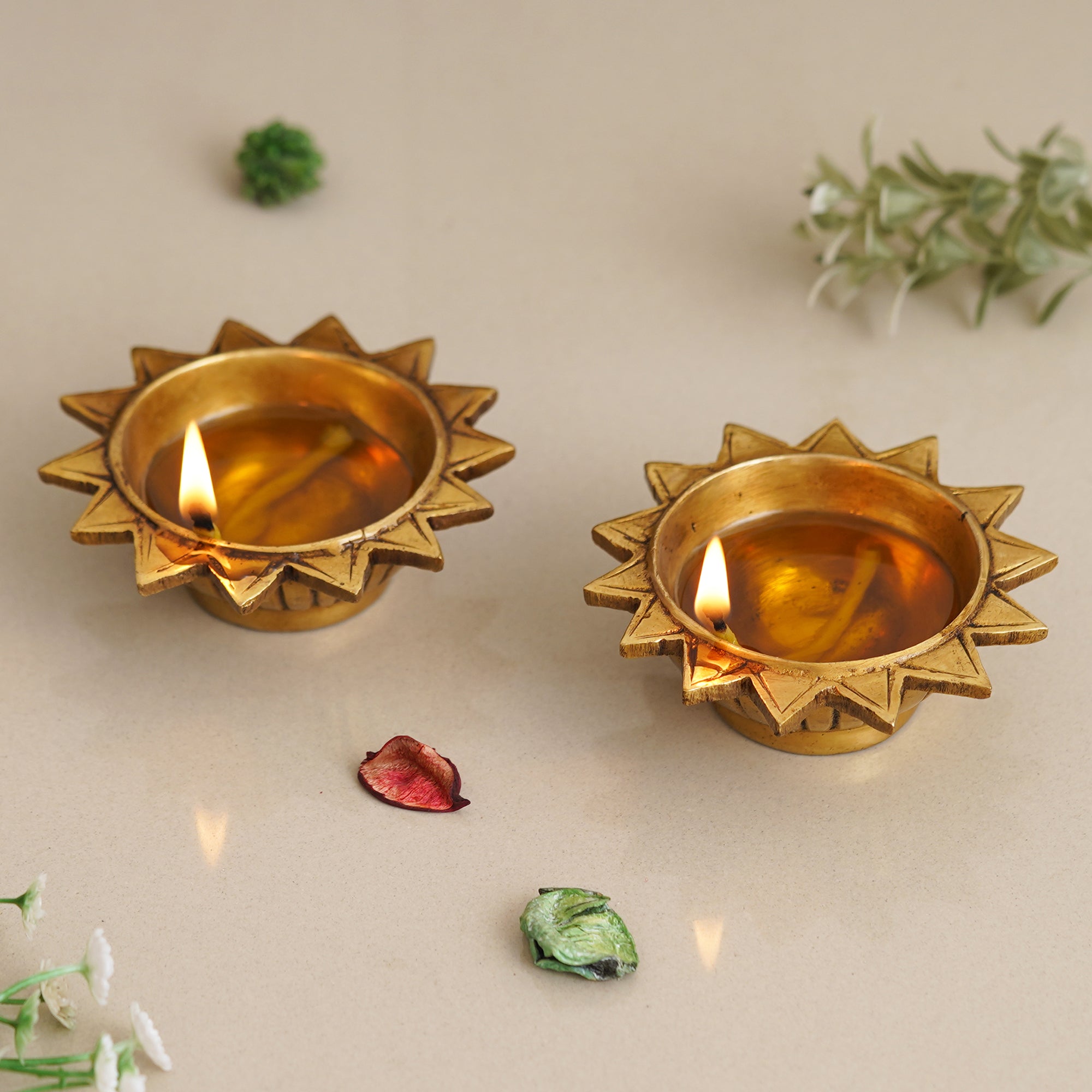 eCraftIndia Set of 2 Golden Sun Shaped Decorative Brass Diyas