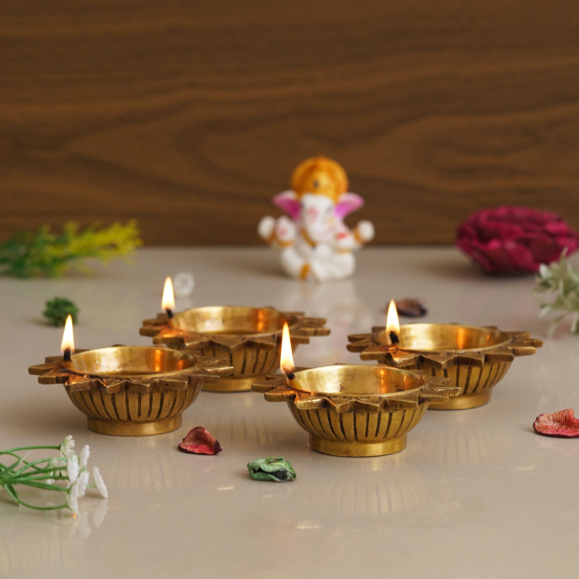 eCraftIndia Set of 4 Golden Sun Shaped Decorative Brass Diyas 4
