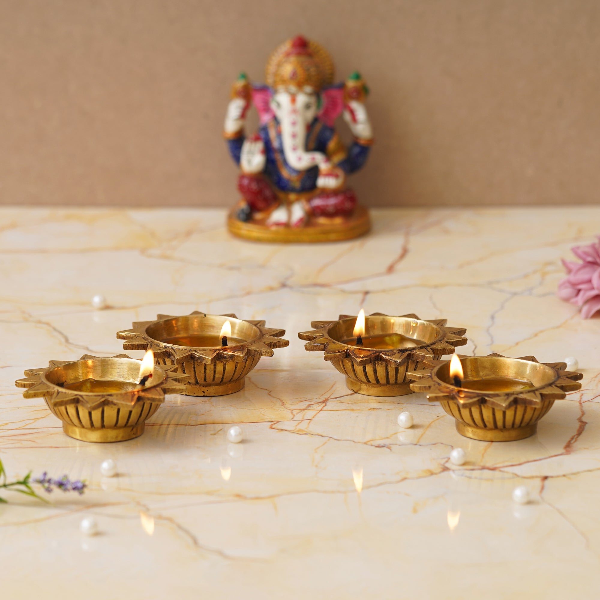 eCraftIndia Set of 4 Golden Sun Shaped Decorative Brass Diyas 5