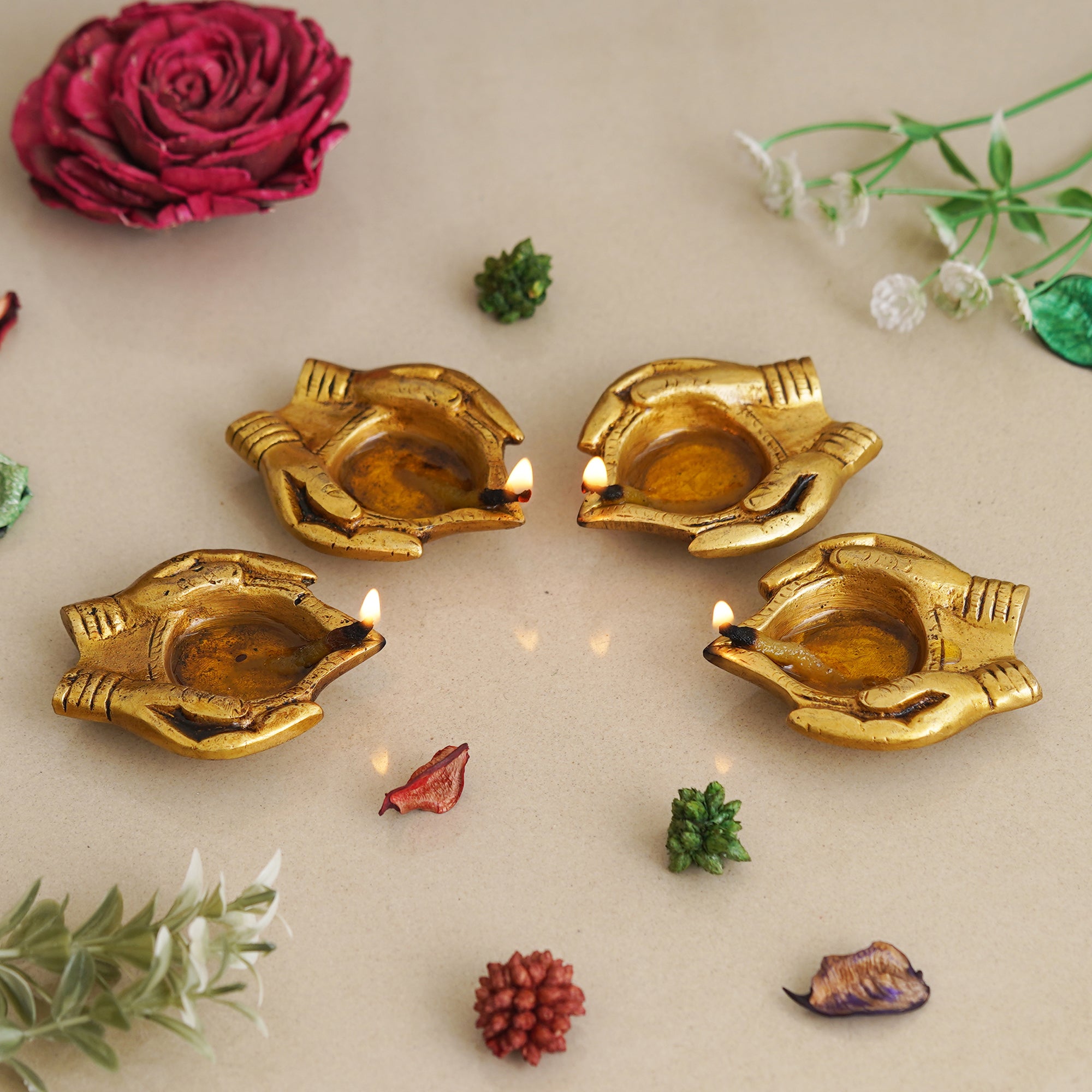 eCraftIndia Set of 4 Lady Hand Holding Ethnic Designer Golden Handcrafted Brass Diyas 1