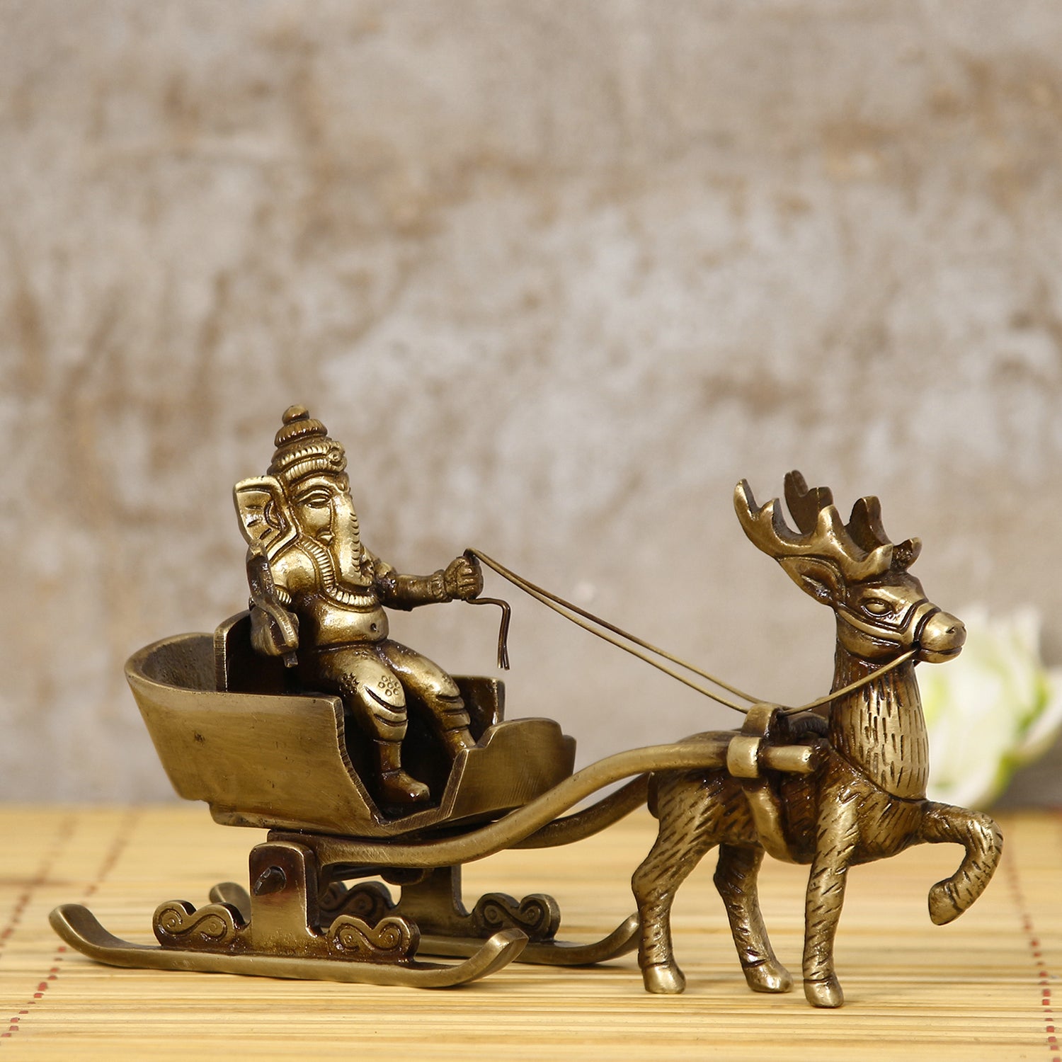 Gold Brass Ganesha Enjoying Ride With Deer Cart Decorative Showpiece