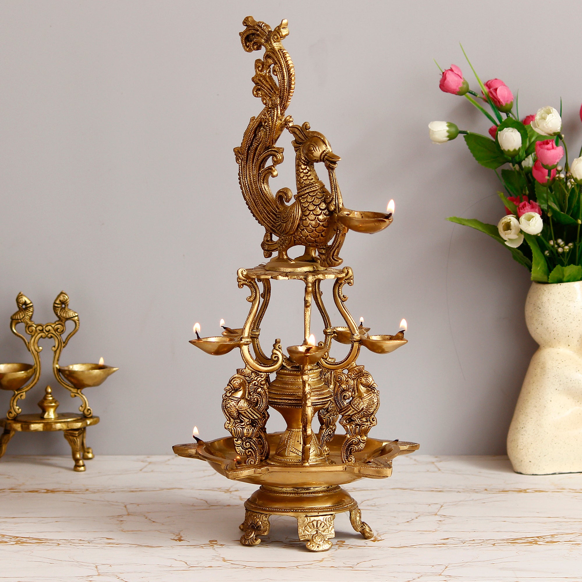 Golden Antique Finish Decorative Handcrafted Brass Peacock Showpiece with Brass Diyas for 11 Wicks and Stand 1