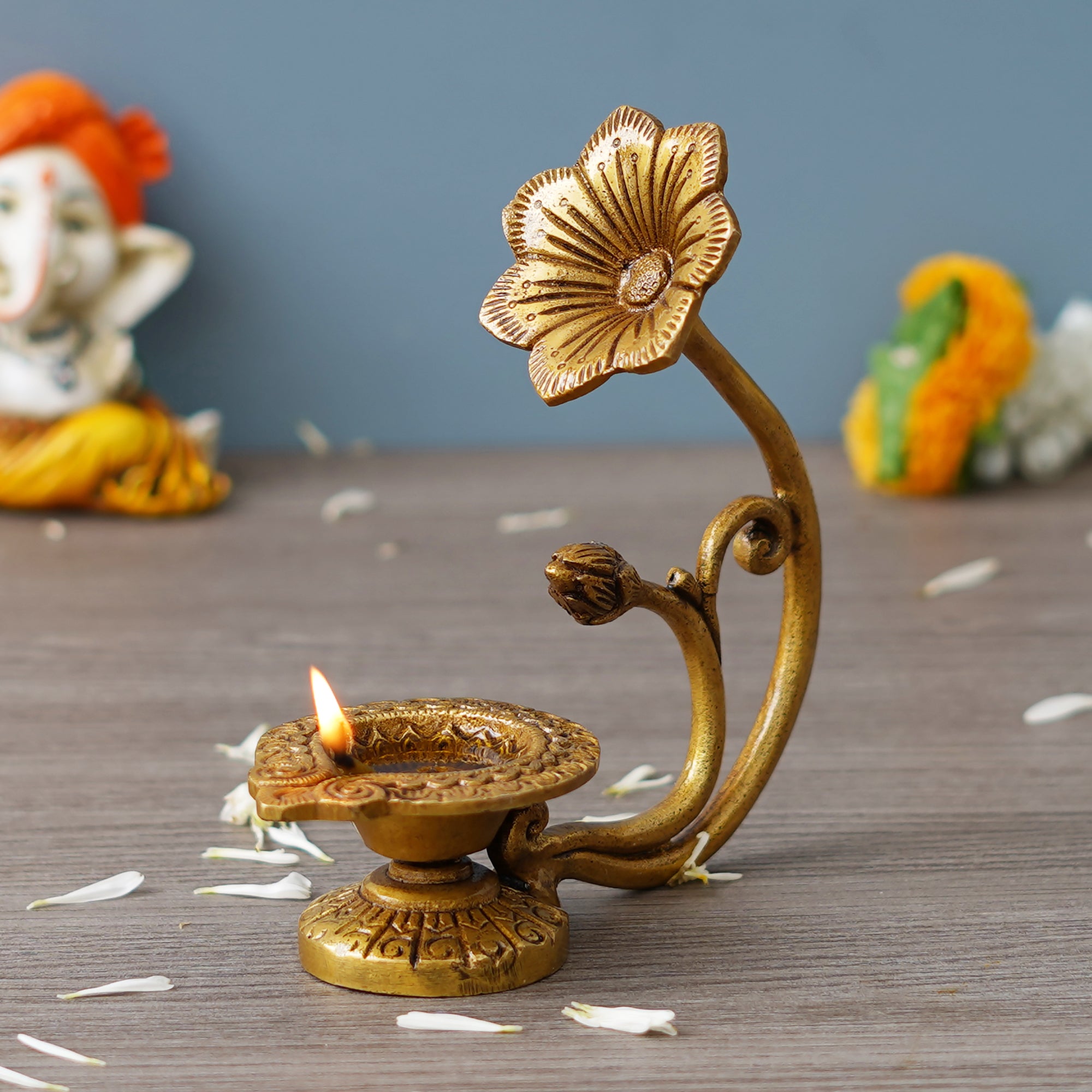 eCraftIndia Golden Decorative Brass Diya with Flower Handle