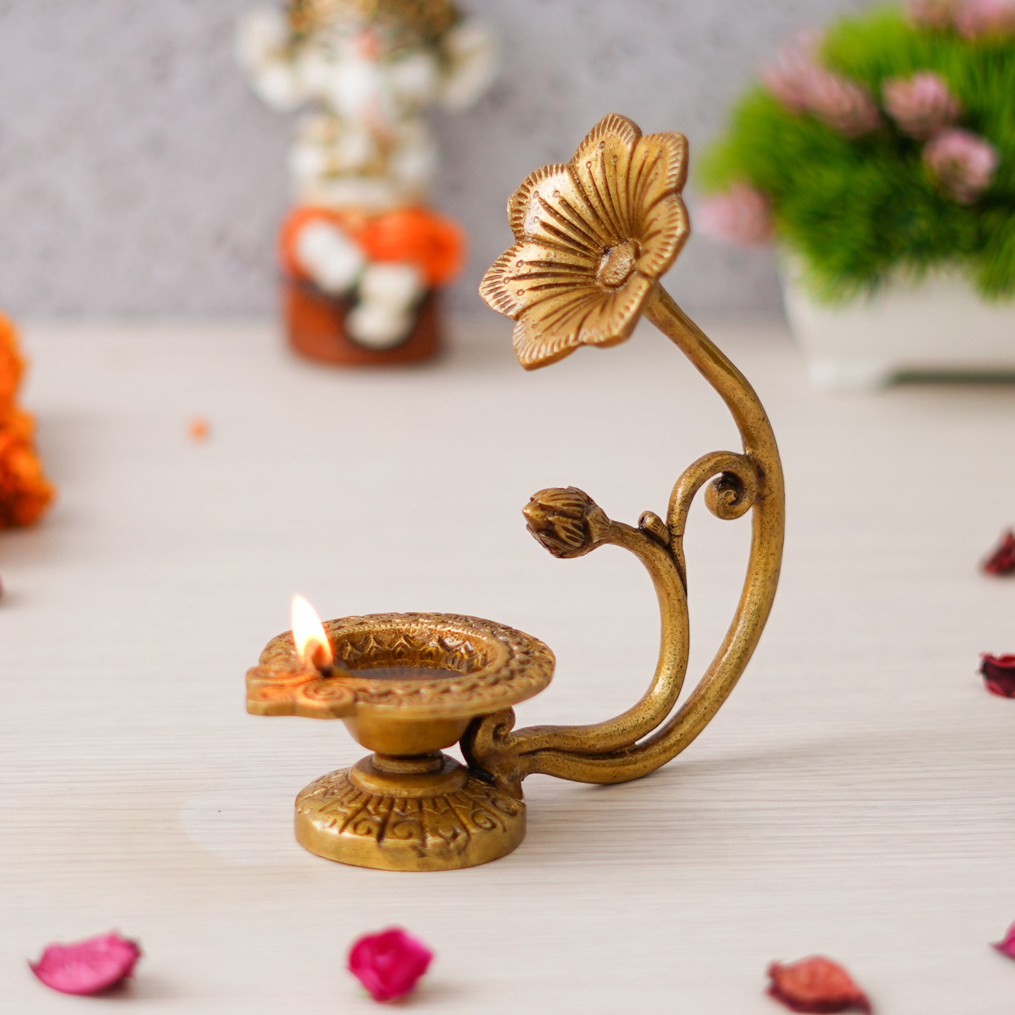 eCraftIndia Golden Decorative Brass Diya with Flower Handle 1