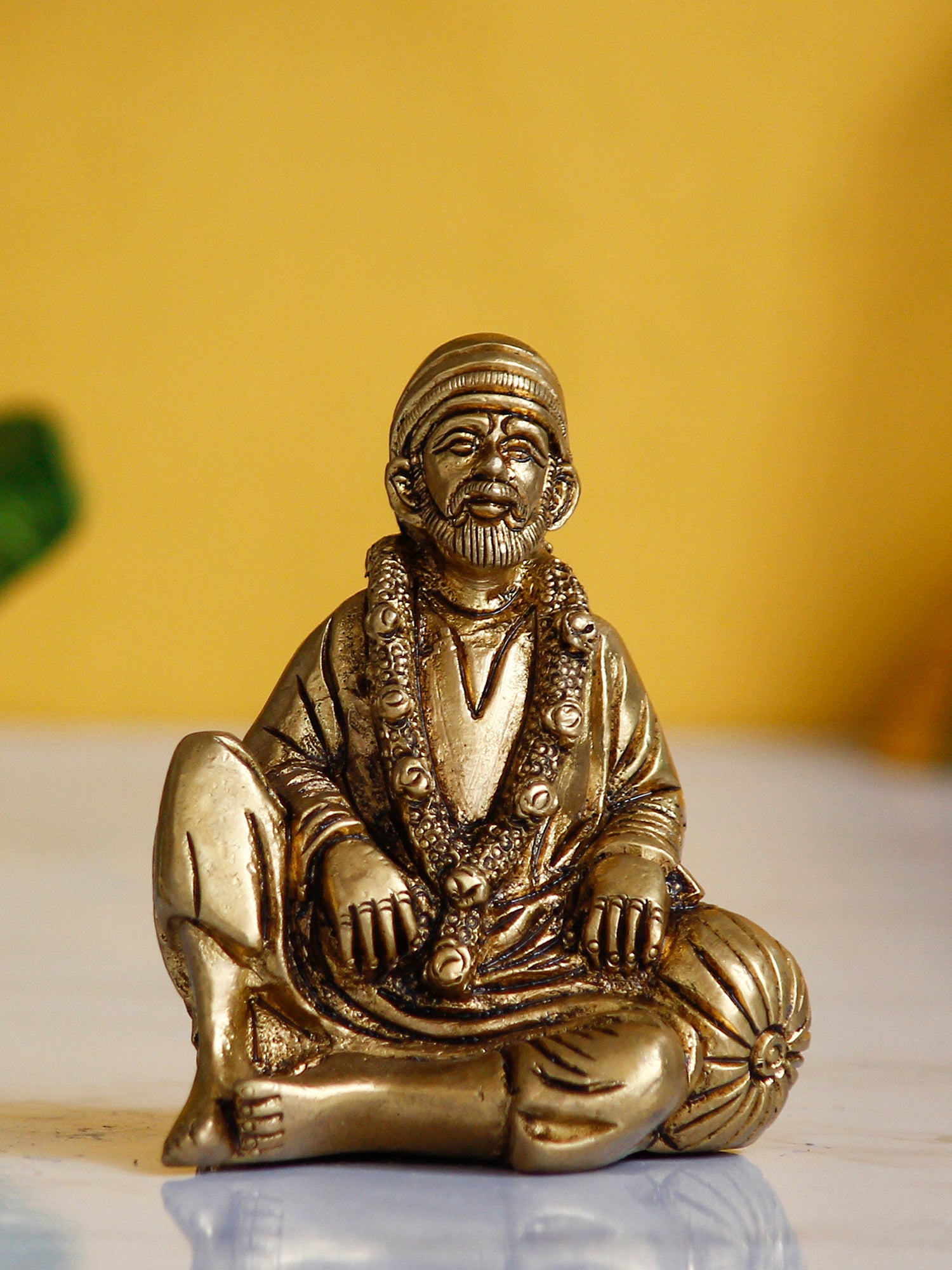 Golden Brass Handcrafted Sitting Sai Baba Idol