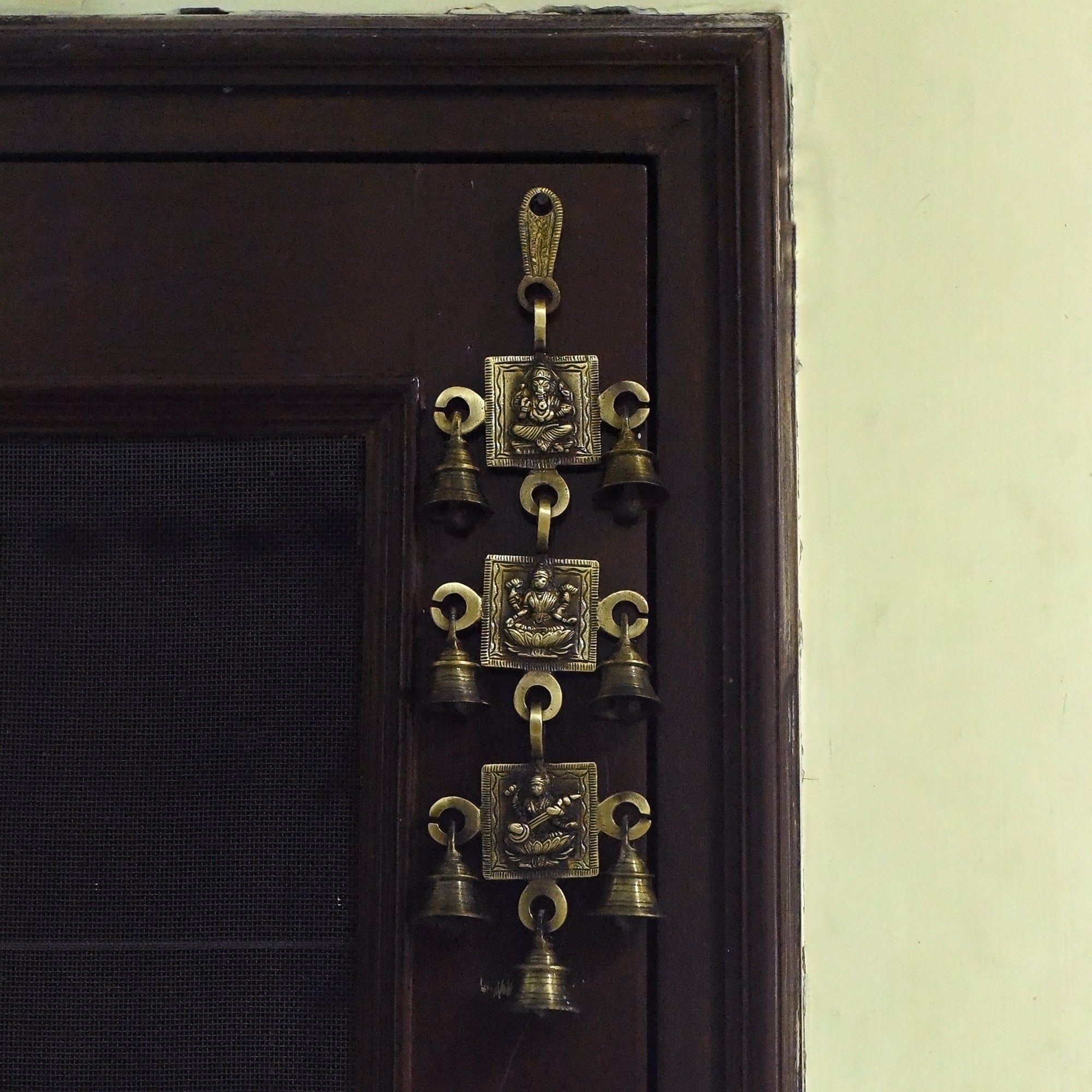 Brown Brass Ganesha Laxmi Saraswati Wall Hanging Bells