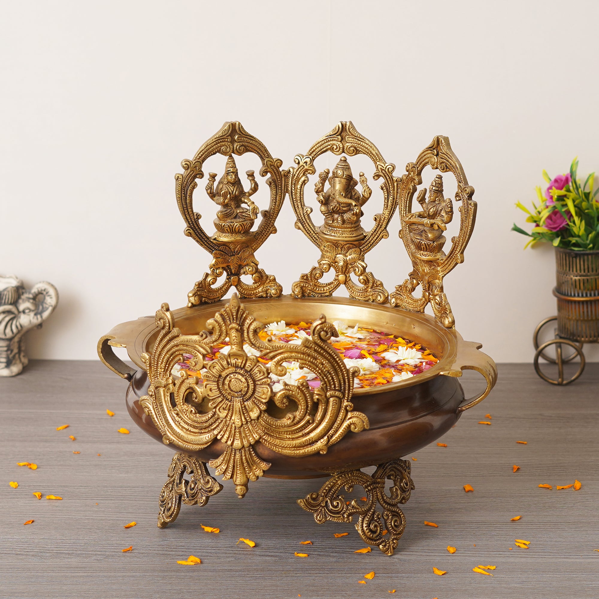 eCraftIndia Golden Lord Ganesha, Goddess Lakshmi & Saraswati Idols Decorative Brass Urli