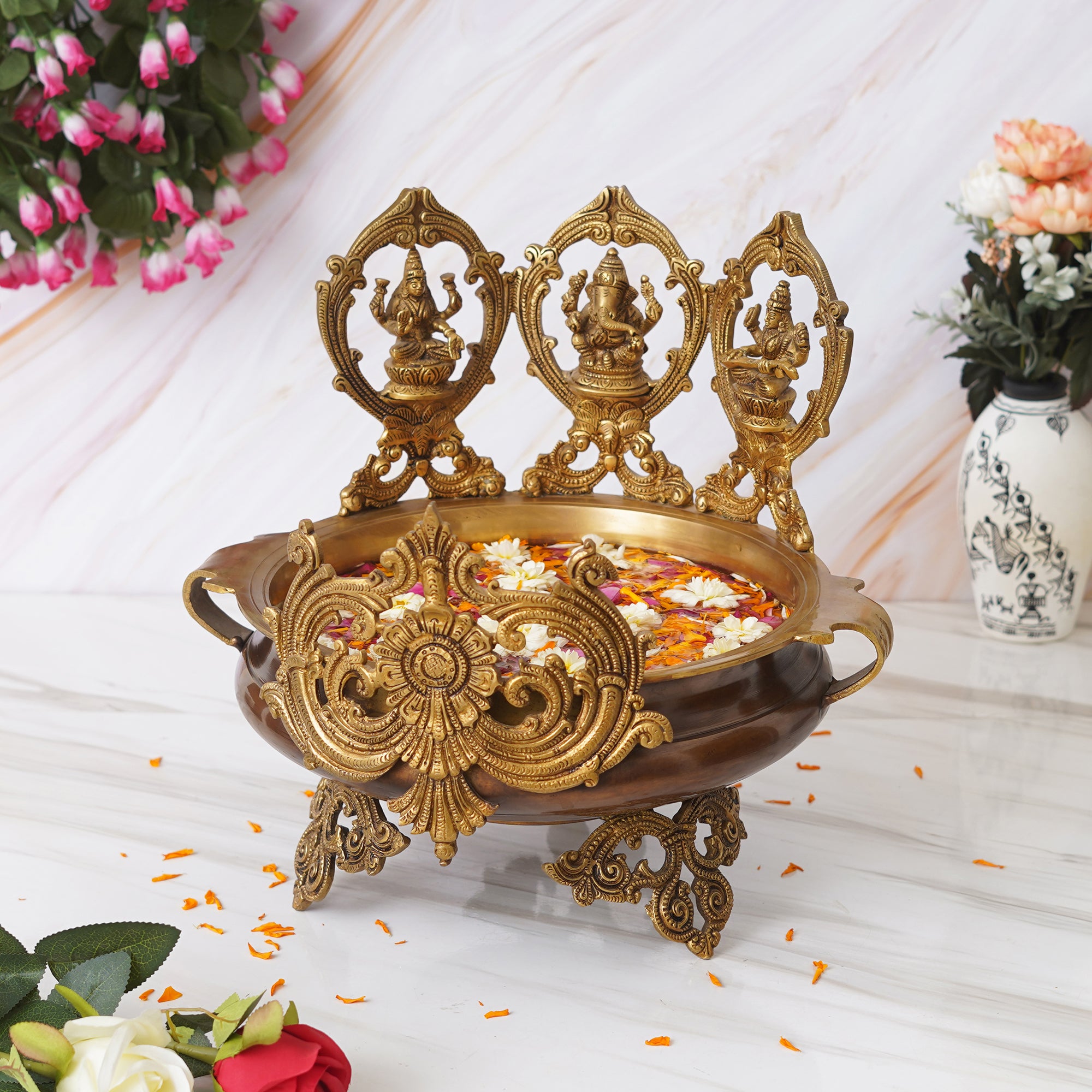 eCraftIndia Golden Lord Ganesha, Goddess Lakshmi & Saraswati Idols Decorative Brass Urli 1