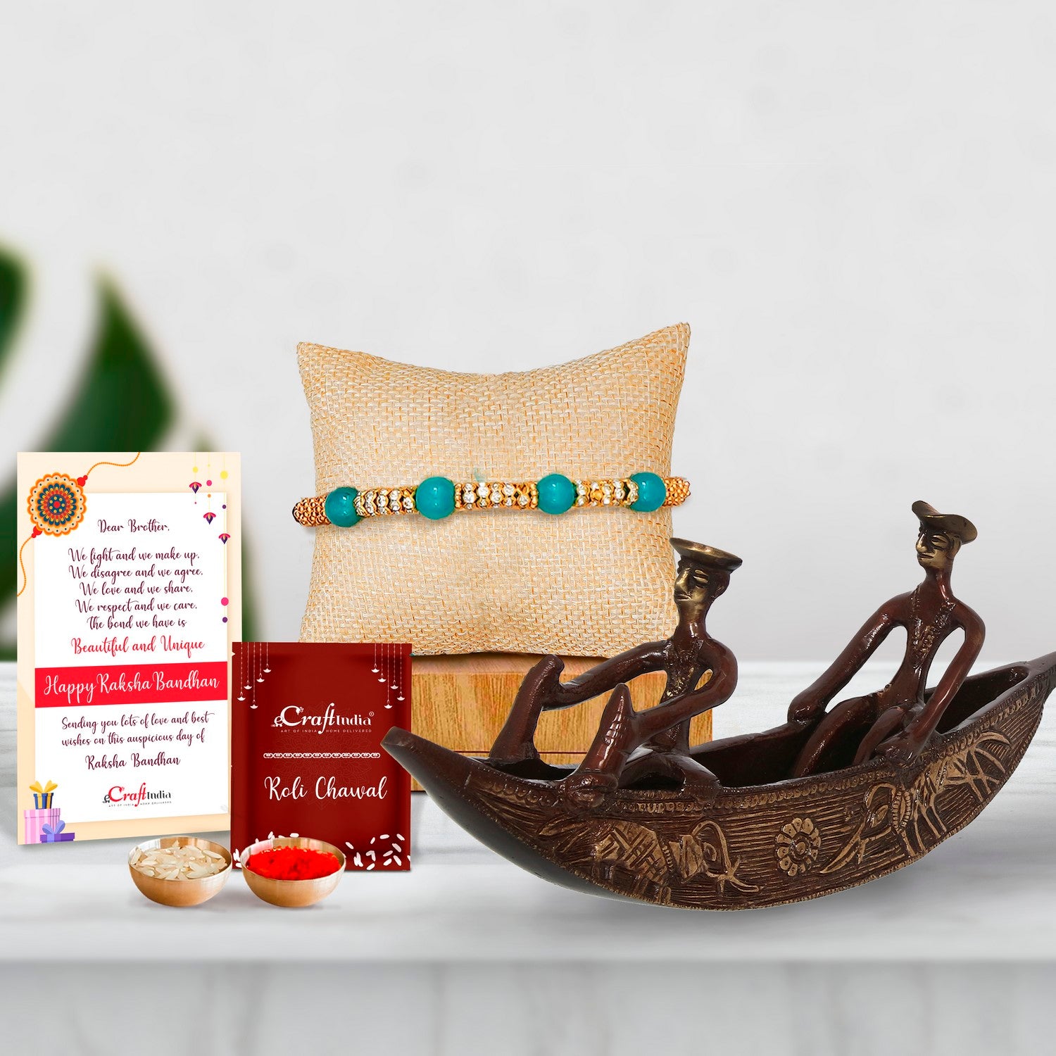 Designer Pearl Rakhi with Antique Finish 2 Men in Boat Brass Decorative Showpiece and Roli Chawal Pack, Best Wishes Greeting Card