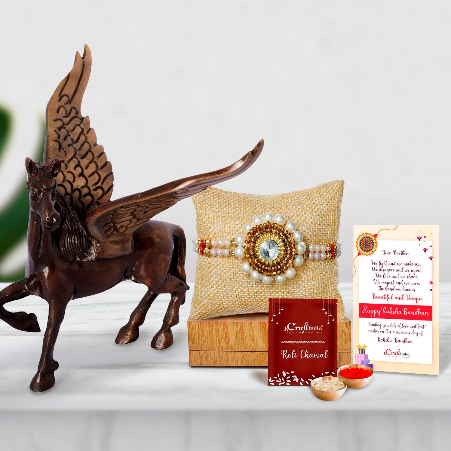 Designer Handcrafted Stone Pearl Rakhi with Brass Antique Finish Flying Angel Horse and Roli Chawal Pack, Best Wishes Greeting Card