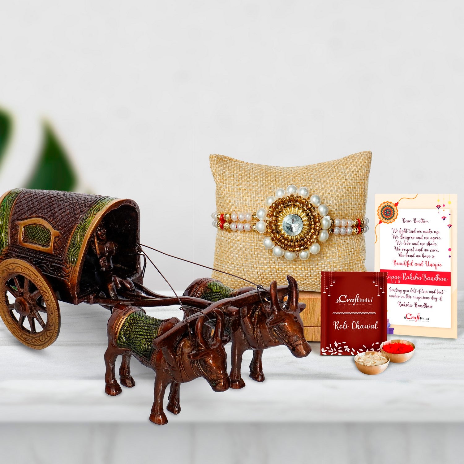 Designer Handcrafted Stone Pearl Rakhi with Brass Brown and Green Antique Finish Closed Bullock Cart  and Roli Chawal Pack, Best Wishes Greeting Card