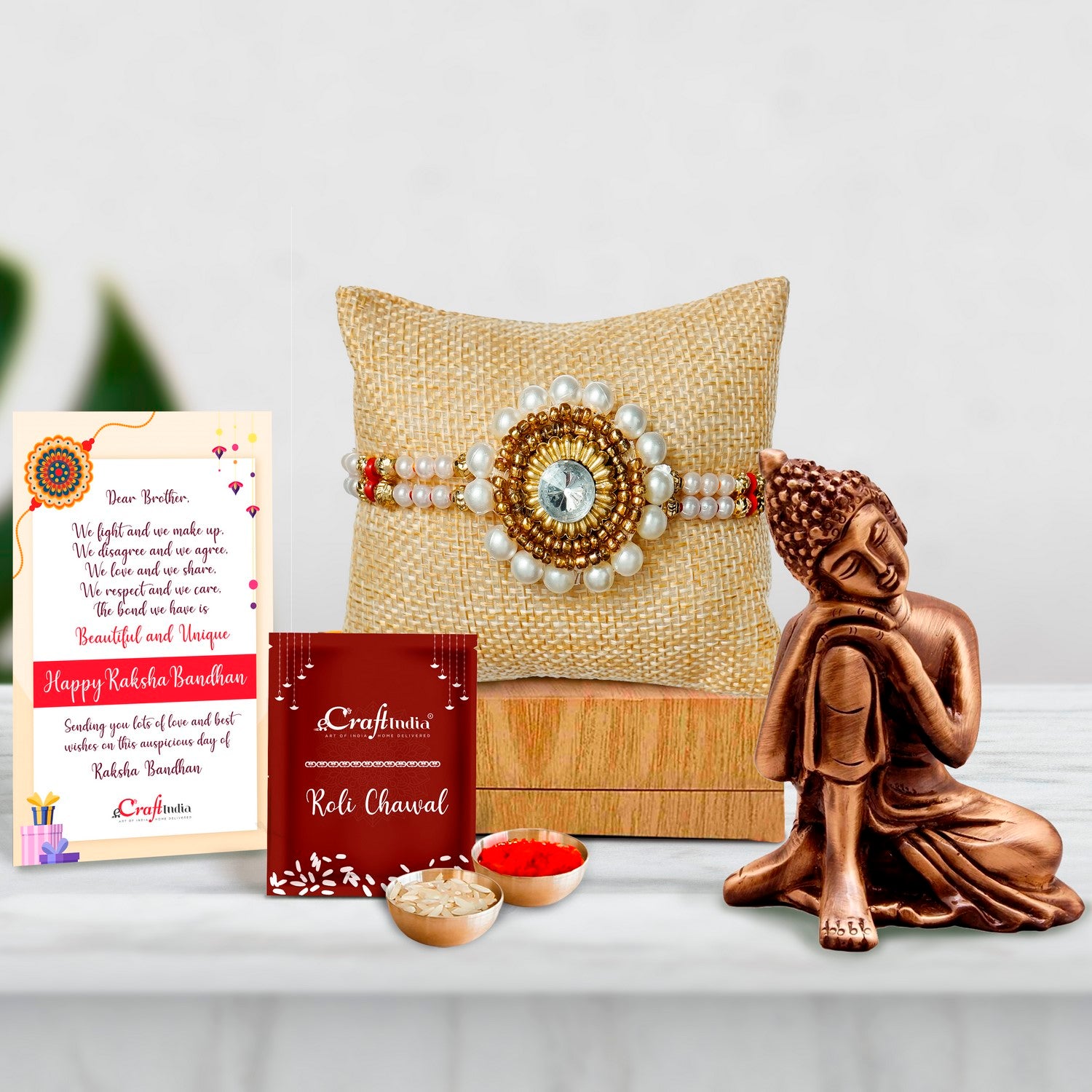 Designer Handcrafted Stone Pearl Rakhi with Brass Buddha Resting Antique Artifact and Roli Chawal Pack, Best Wishes Greeting Card
