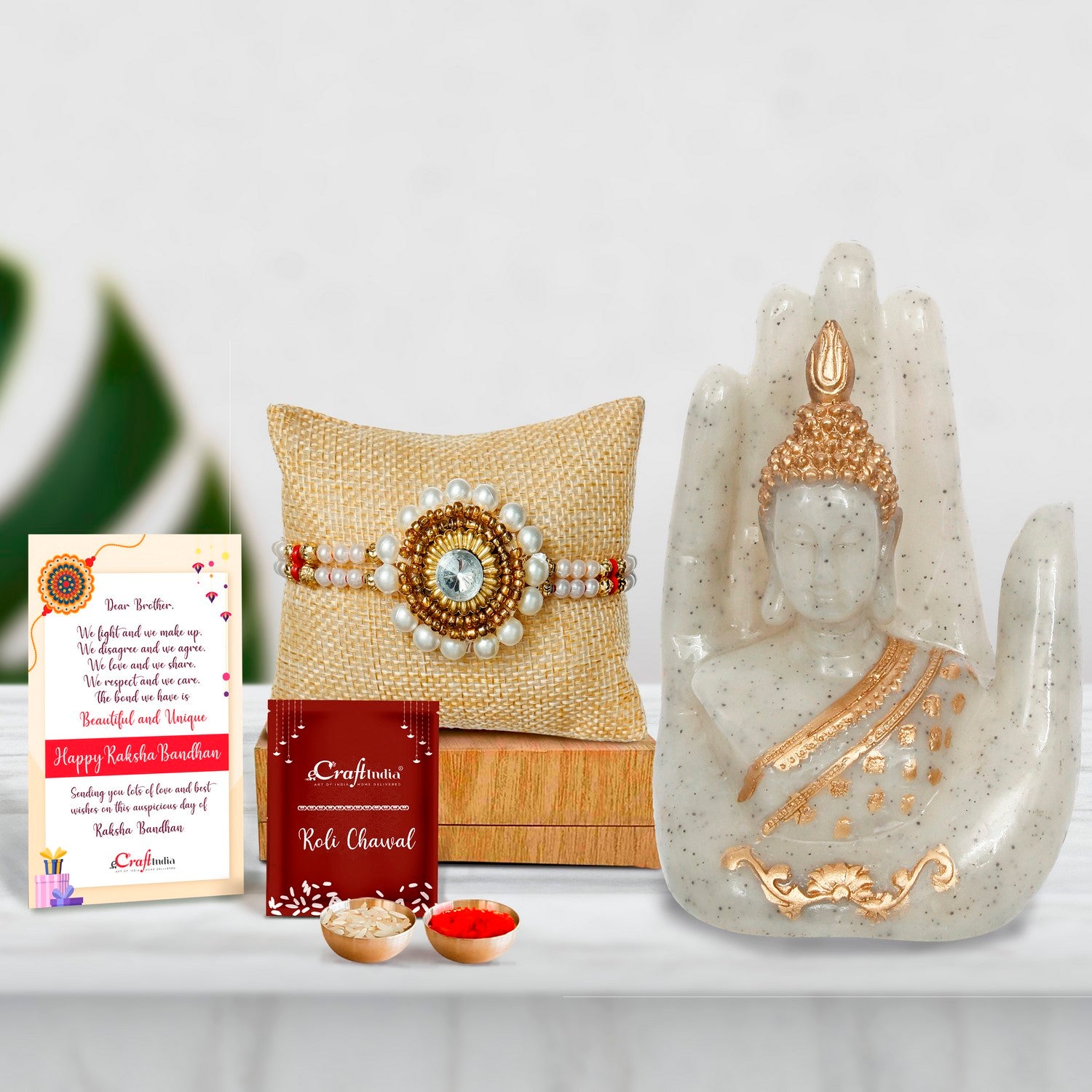 Designer Handcrafted Stone Pearl Rakhi with Golden Silver Handcrafted Palm Buddha Showpiece and Roli Chawal Pack, Best Wishes Greeting Card