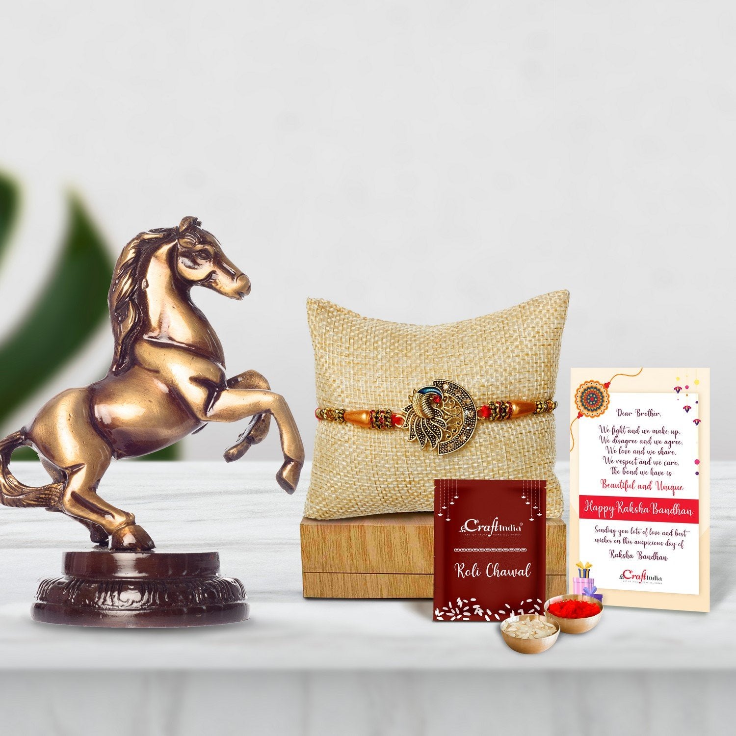 Designer Peacock Rakhi with Brass Horse Tableware Antique Showpiece and Roli Chawal Pack, Best Wishes Greeting Card