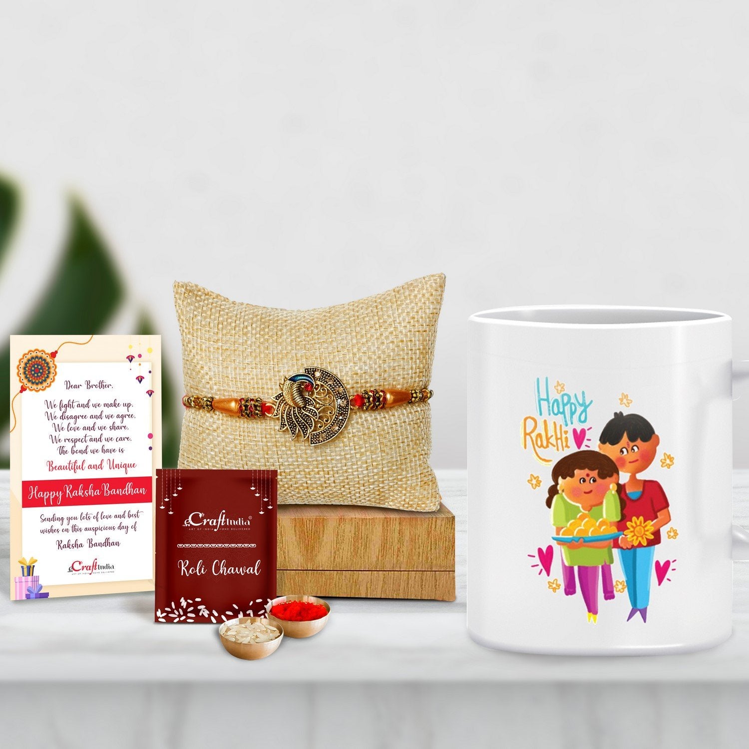 Designer Peacock Rakhi with Mug for Brother and Roli Chawal Pack, Best Wishes Greeting Card