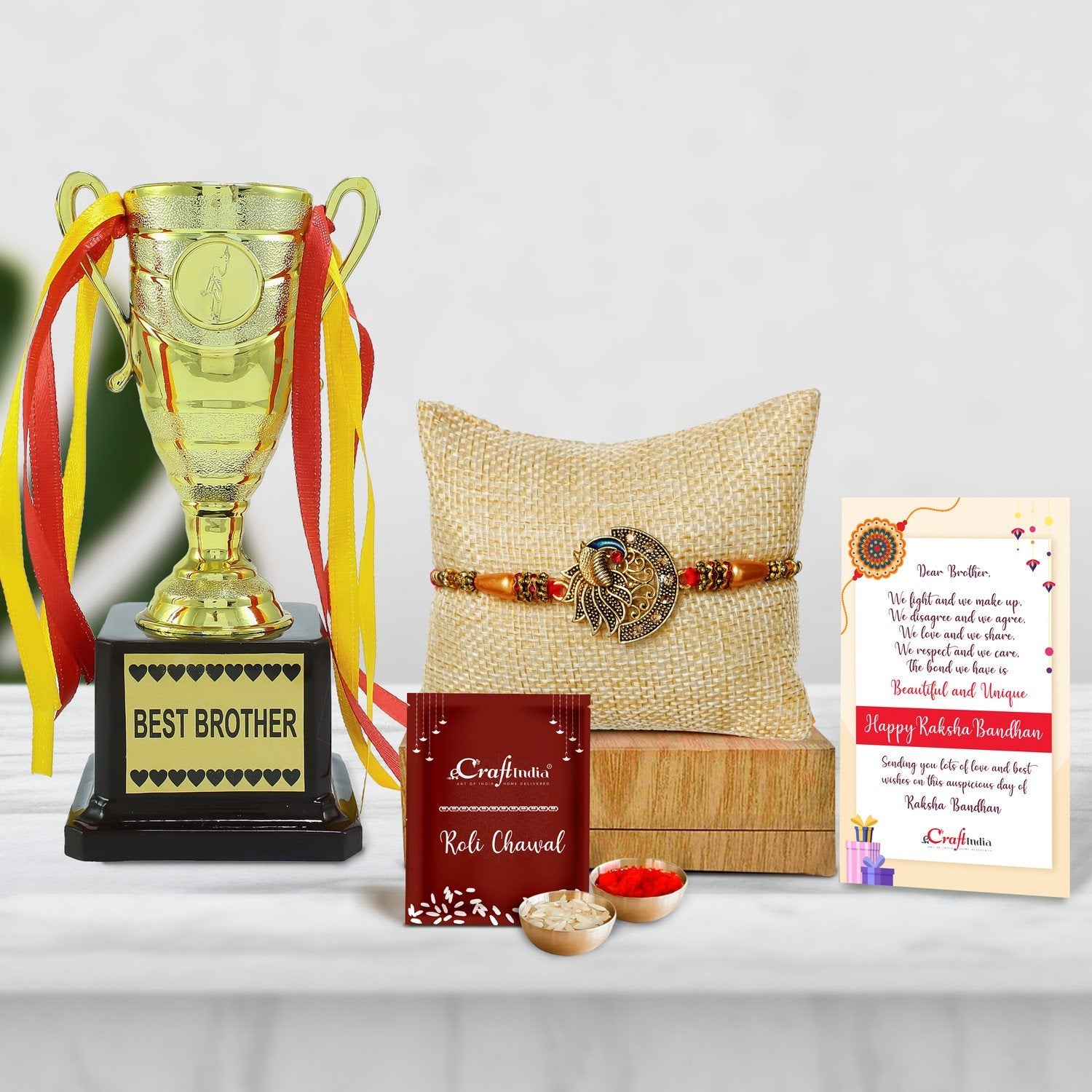 Designer Peacock Rakhi with Best Brother Trophy and Roli Chawal Pack, Best Wishes Greeting Card