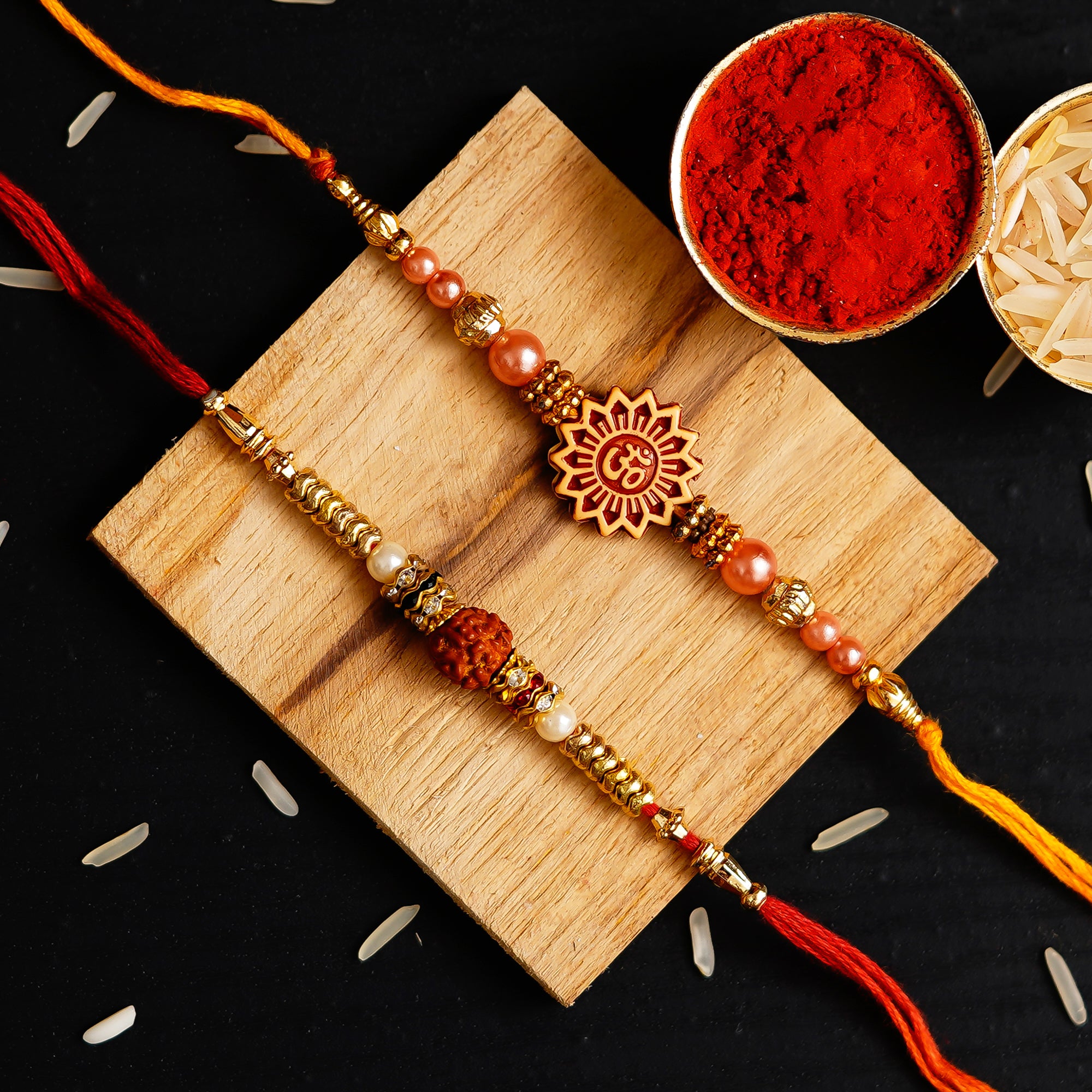 Pack of 2 Om and Rudraksh Rakhis and Roli Chawal Pack