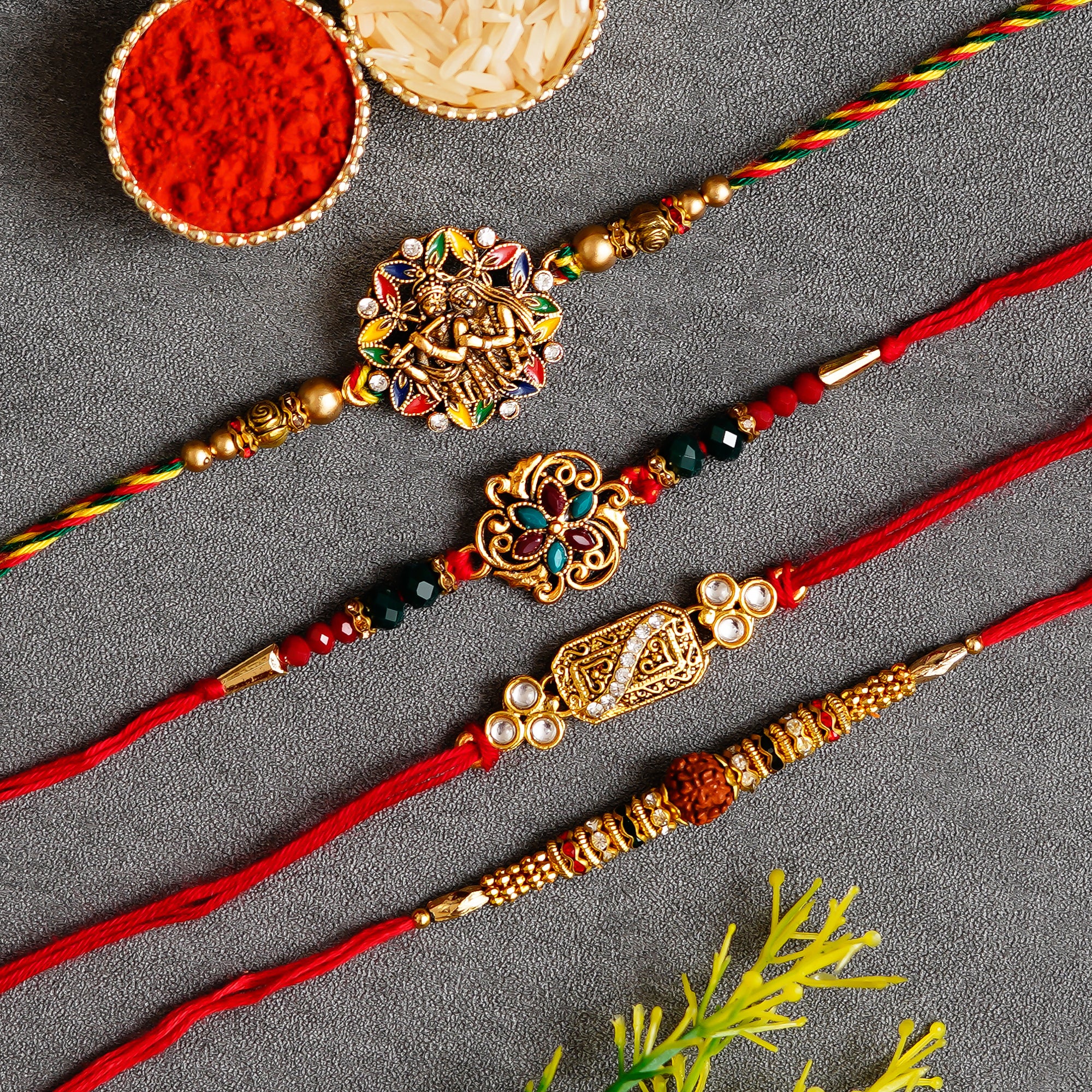 Pack of 4 Designer Rakhis and Roli Chawal Pack - eCraftIndia Online