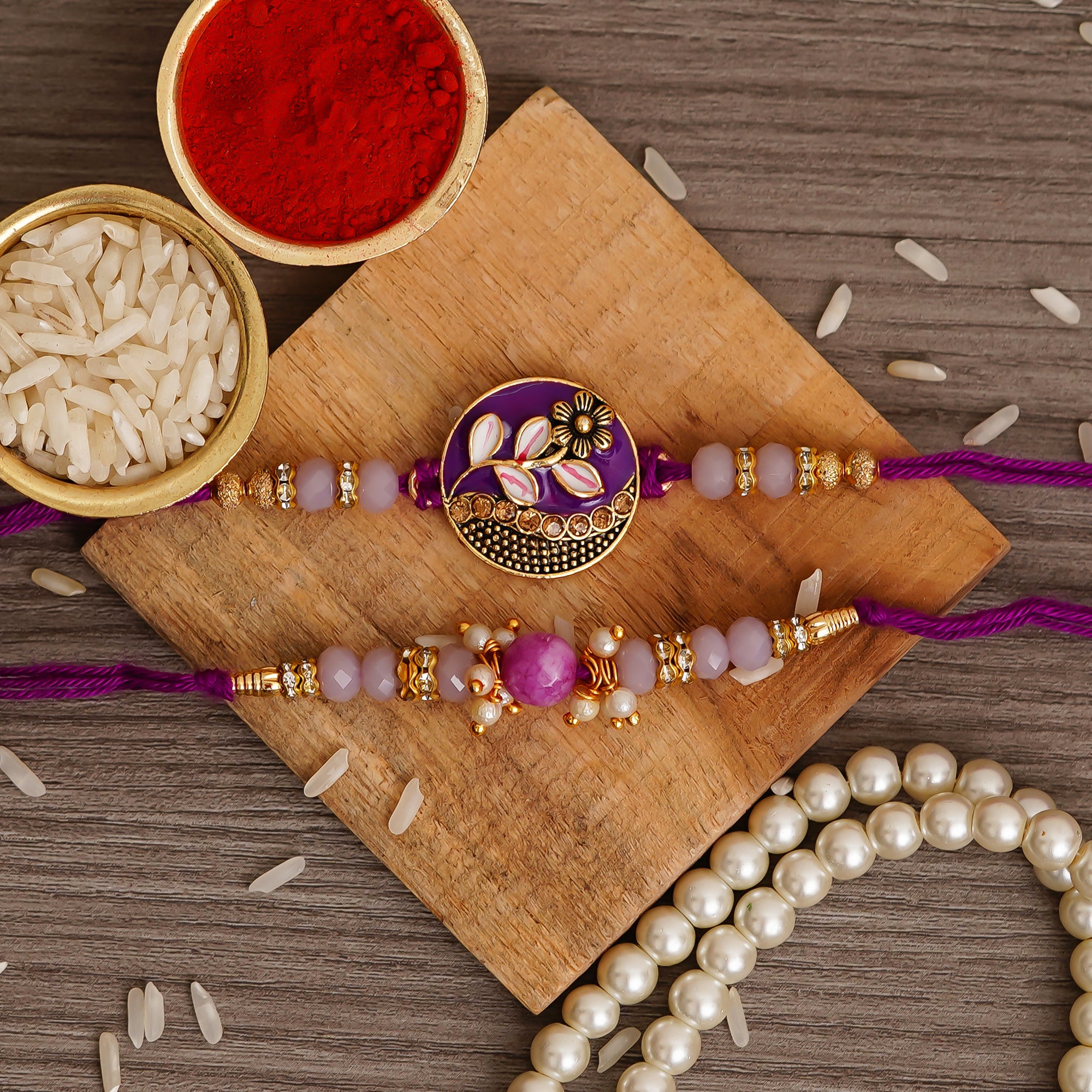 Purple Floral & Pearl Pack of 2 Desginer Rakhis and Roli Chawal Pack ...