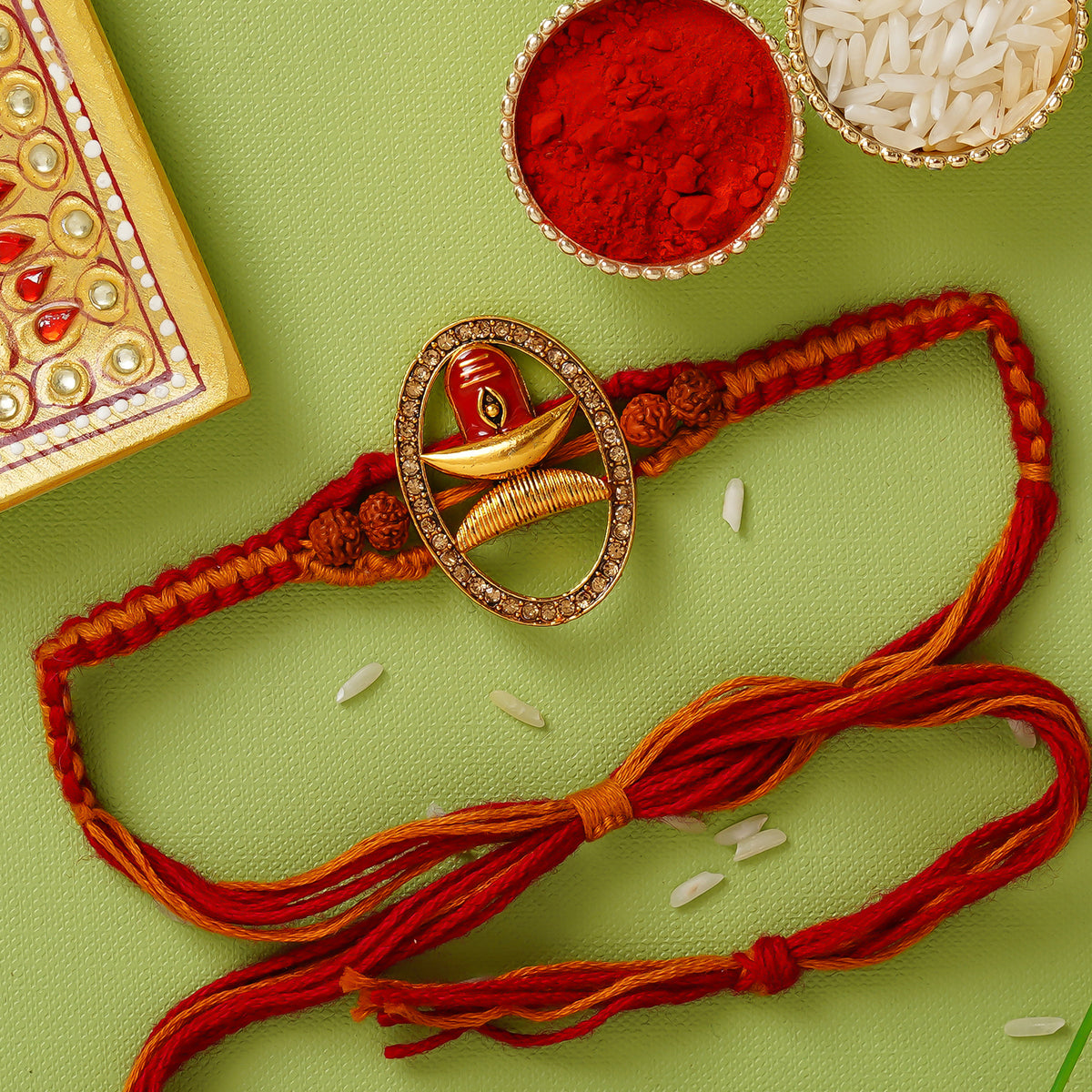 Red & Orange Shivling Religious Rakhi and Roli Chawal Pack ...