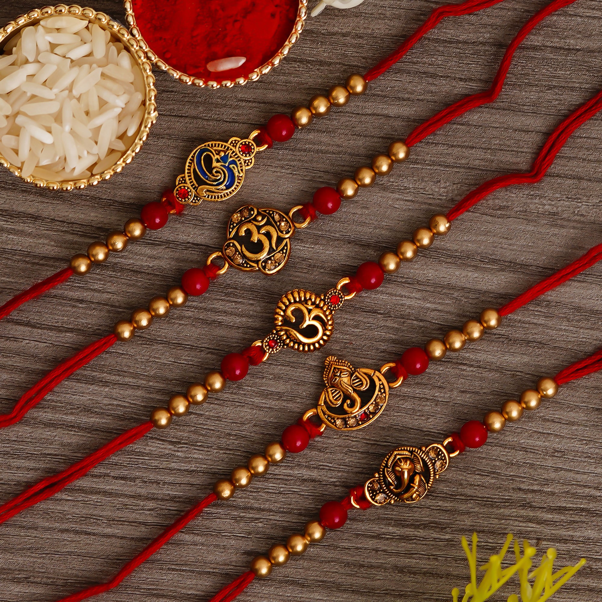 Red & Golden Pack of 5 Designer Religious Rakhis and Roli Chawal Pack