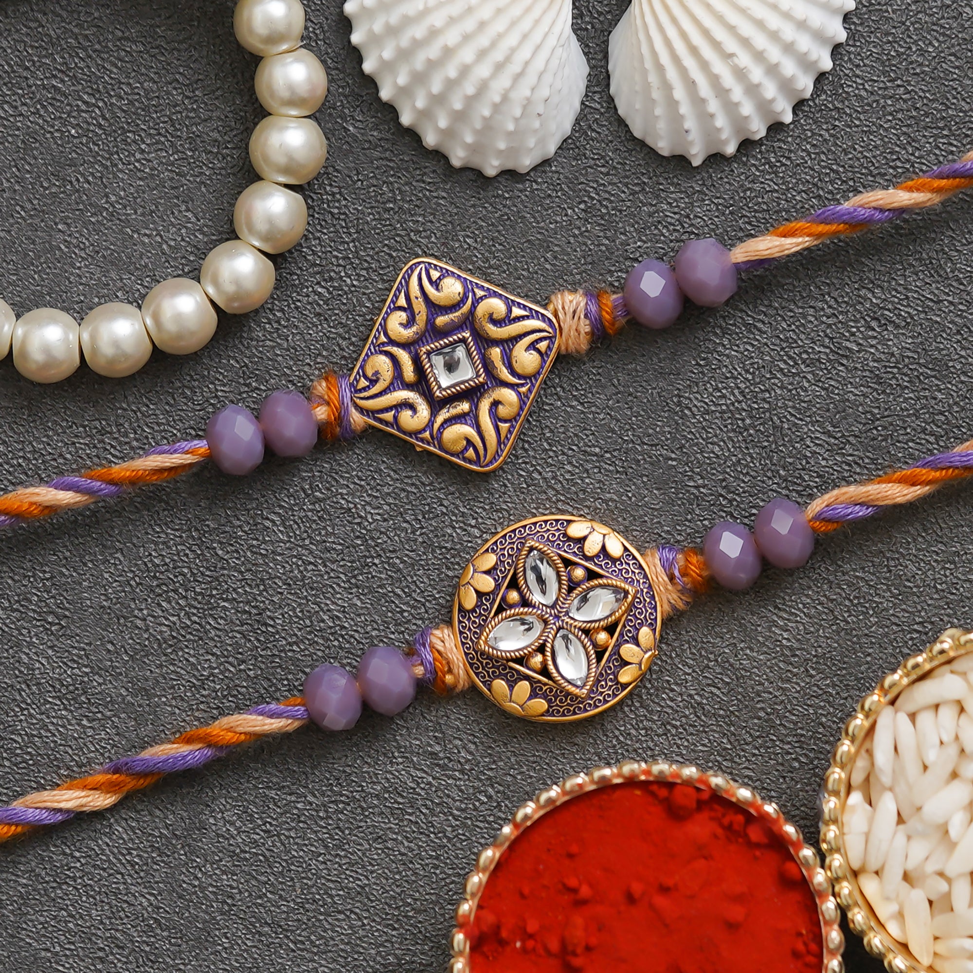 eCraftIndia Purple and Golden Set of 2 Precious Stone Designer Rakhis