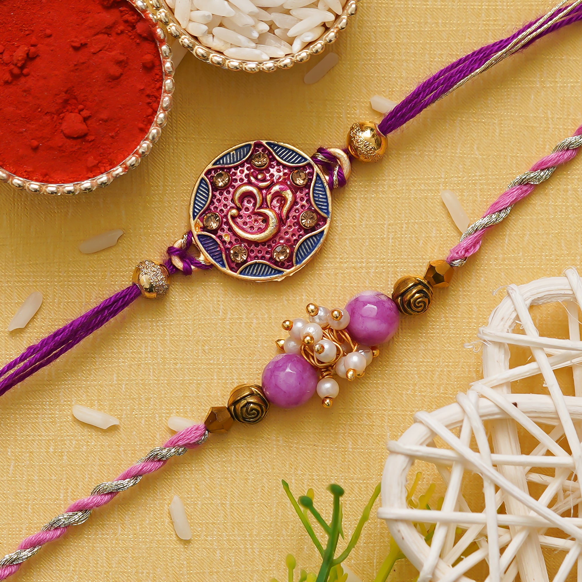 eCraftIndia Purple & Golden Set of 2 Om Symbol and Pearl Designer Rakh